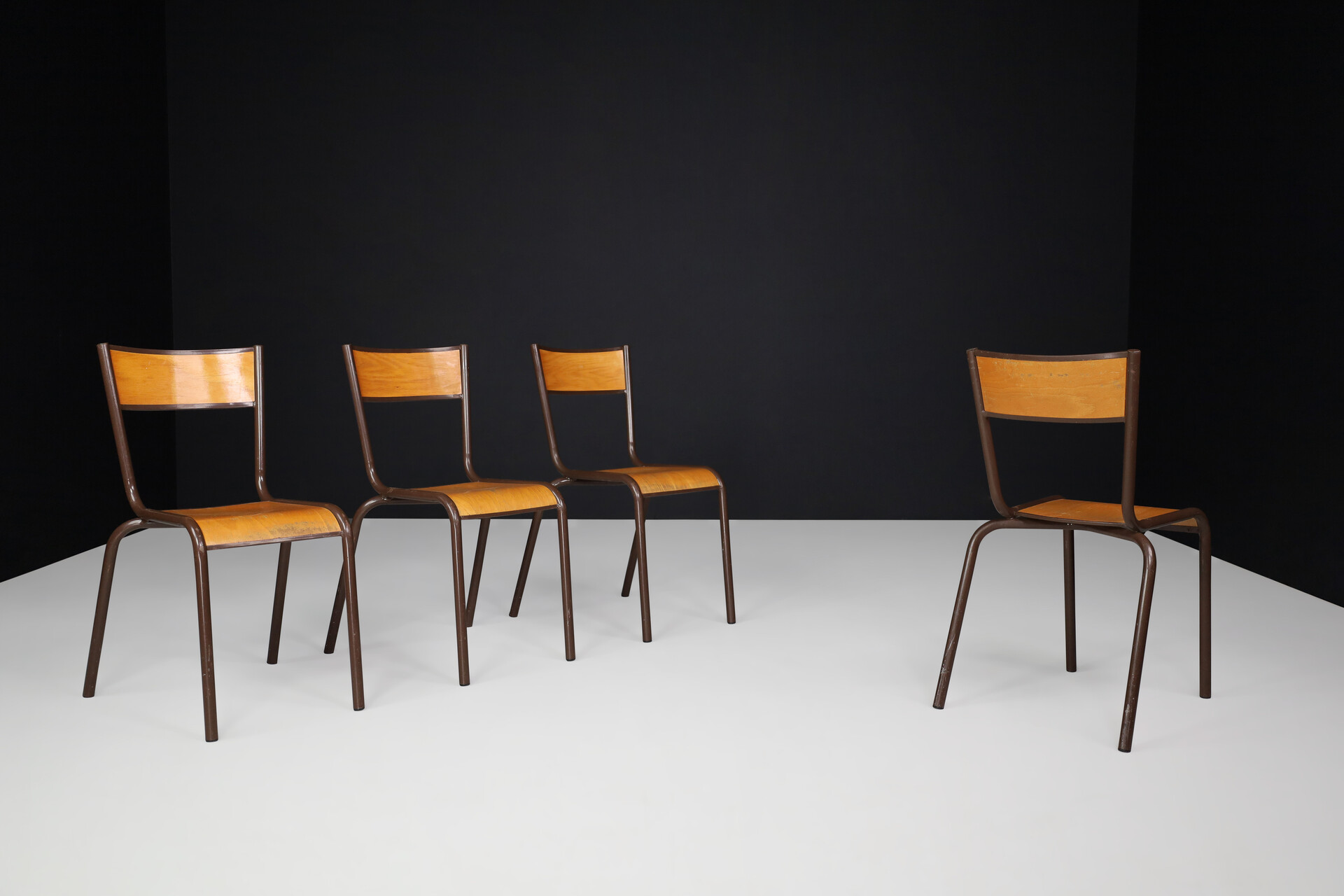 Industrial Stacking Mulca Dining Chairs Plywood and steel, France 1970s Late-20th century