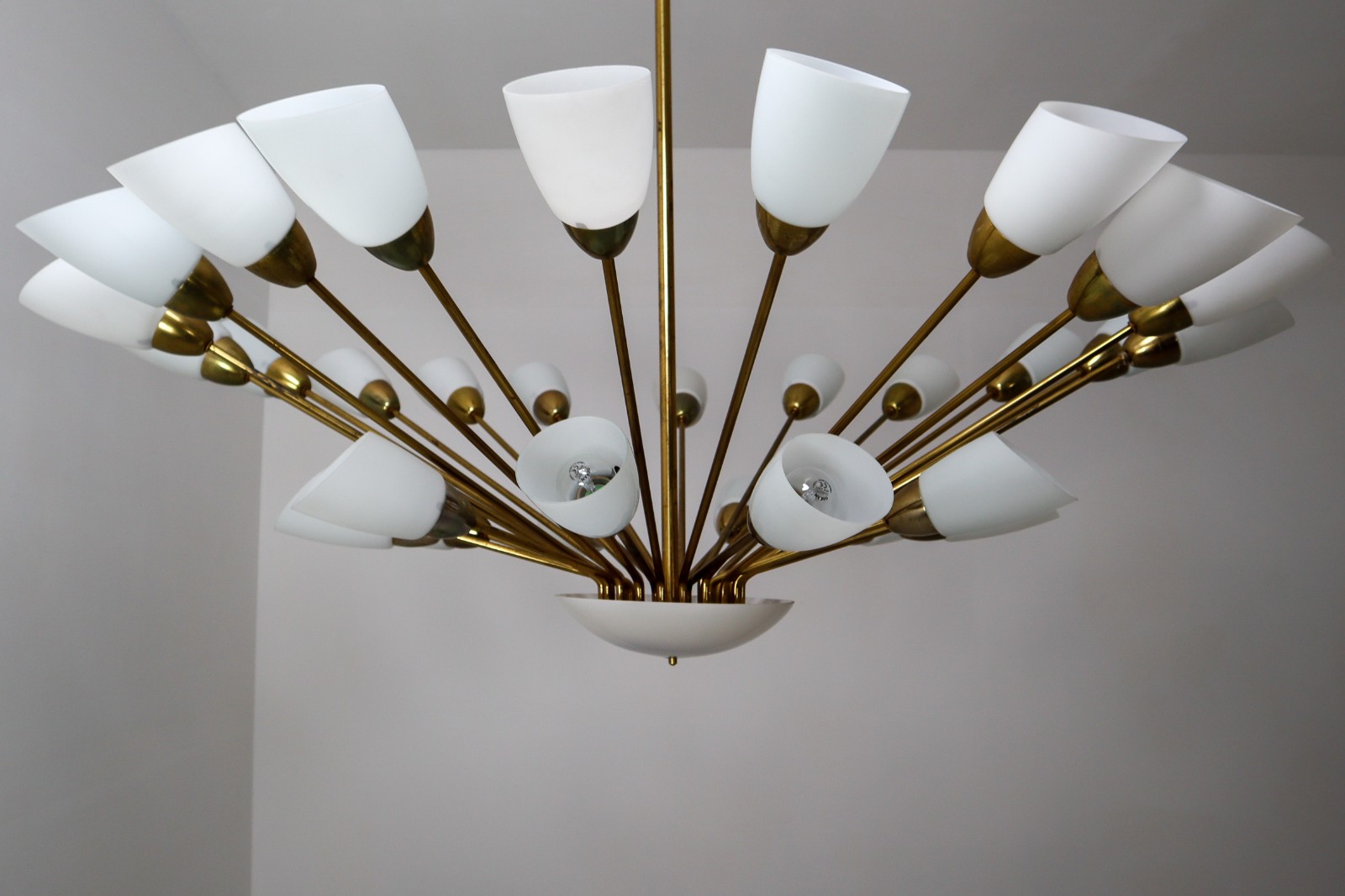 Large Midcentury Spider Form Sputnik Chandelier in Brass and 30 Glass Shades.