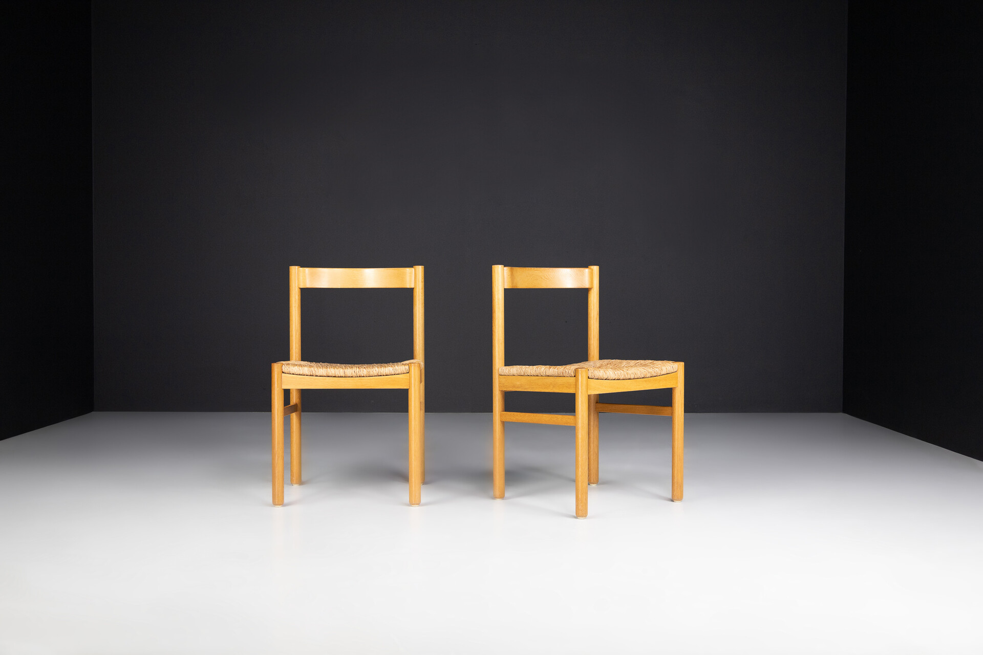 Mid century modern Beechwood and rush side chairs in the style of Charlotte Perriand , France 1960s Mid-20th century
