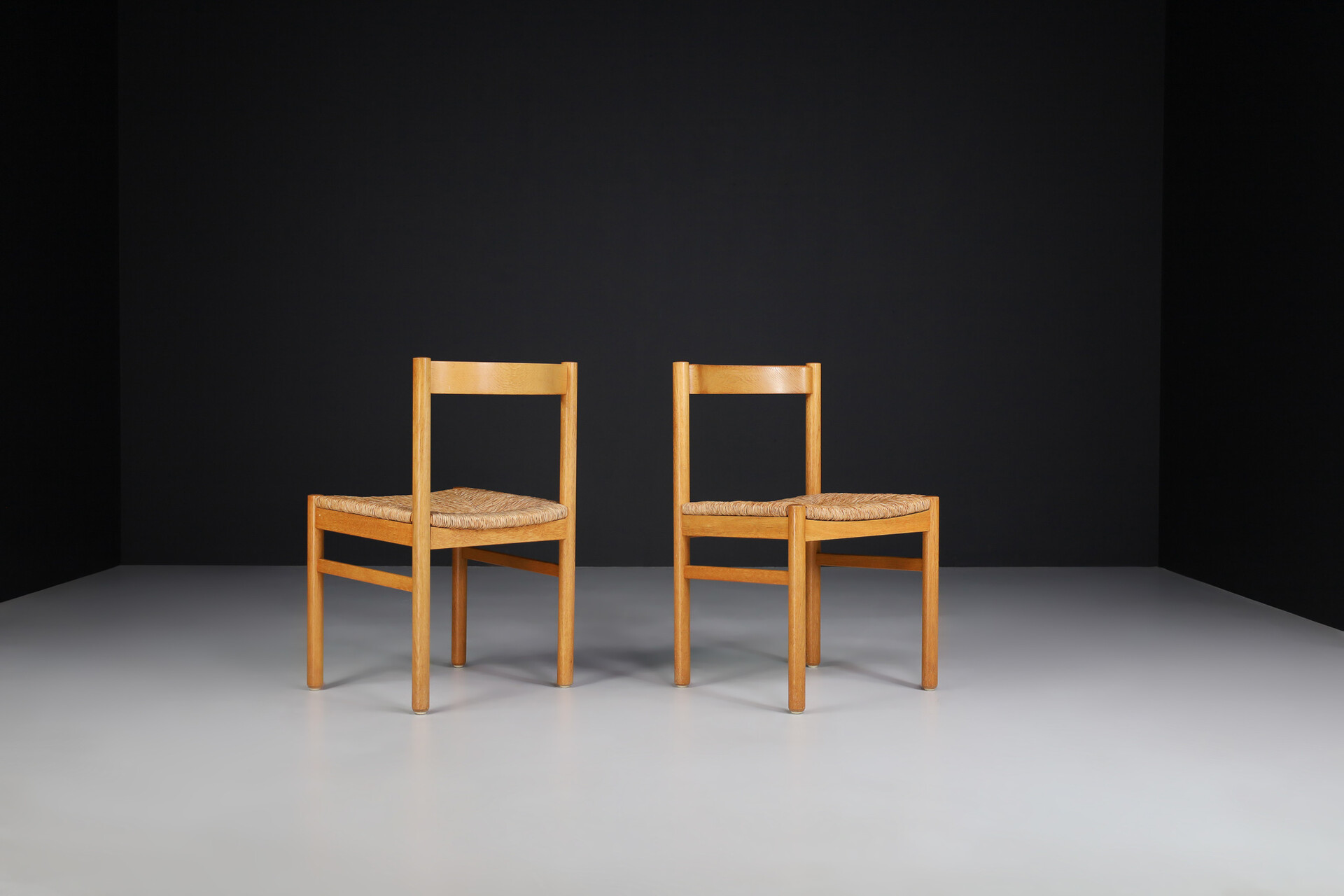 Mid century modern Beechwood and rush side chairs in the style of Charlotte Perriand , France 1960s Mid-20th century