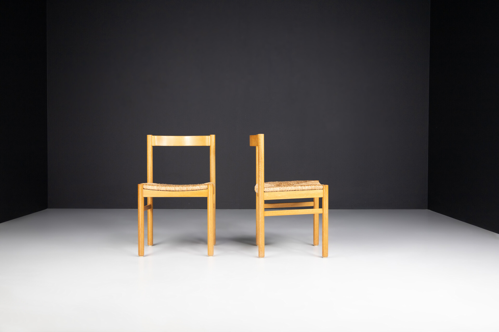 Mid century modern Beechwood and rush side chairs in the style of Charlotte Perriand , France 1960s Mid-20th century