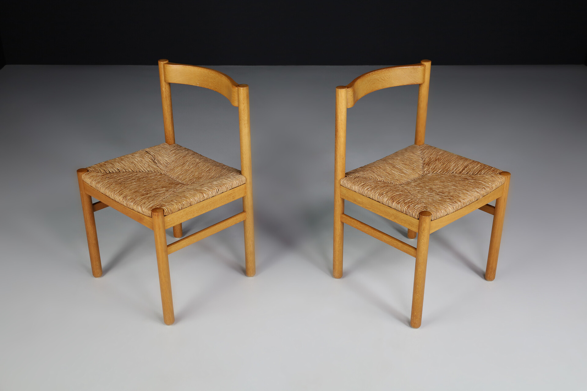 Mid century modern Beechwood and rush side chairs in the style of Charlotte Perriand , France 1960s Mid-20th century