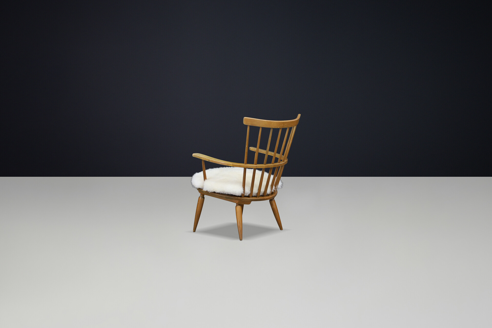 Mid century modern Beechwood Armchairs with sheepskin cushions for Altheim by Franz Schuster 1950s Austria. Mid-20th century