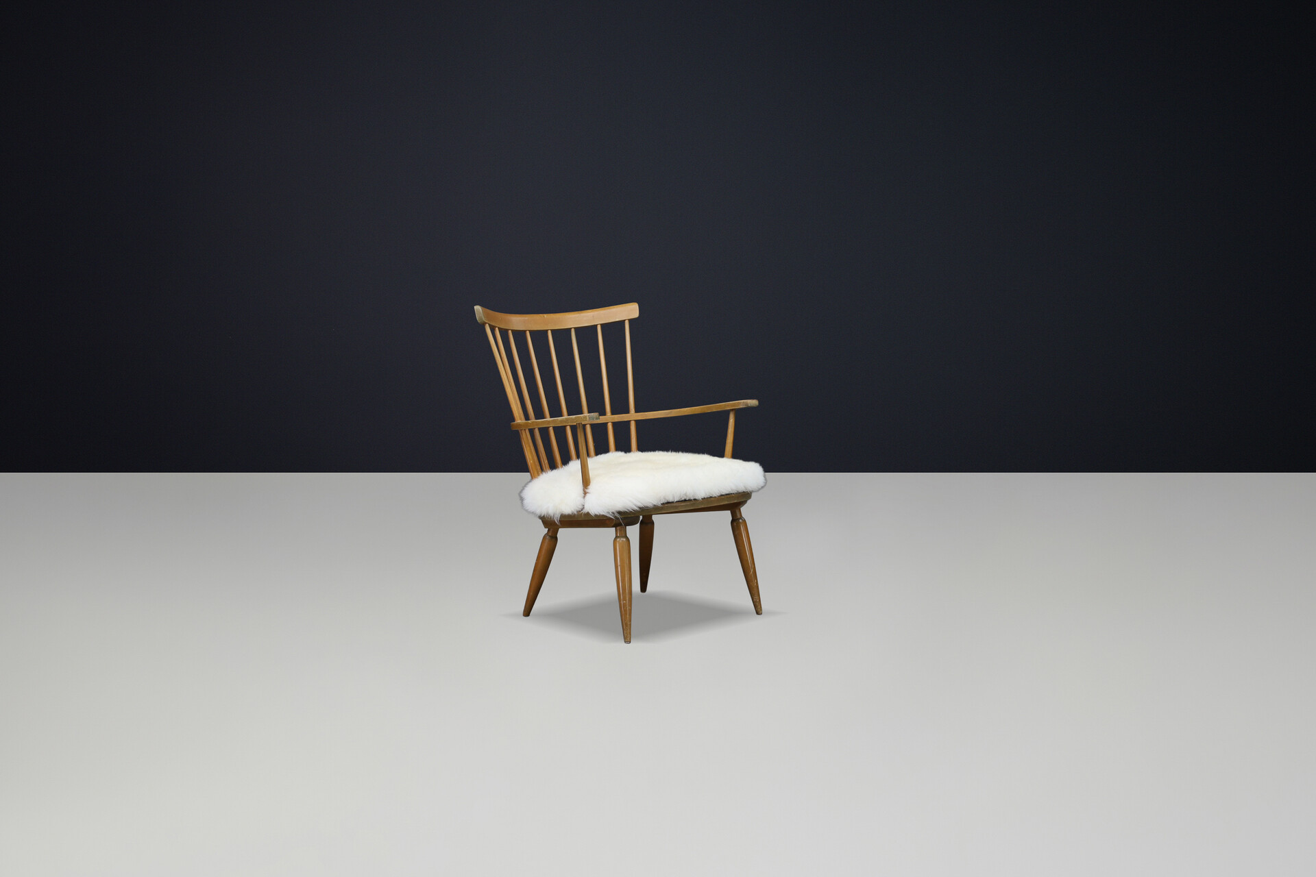 Mid century modern Beechwood Armchairs with sheepskin cushions for Altheim by Franz Schuster 1950s Austria. Mid-20th century