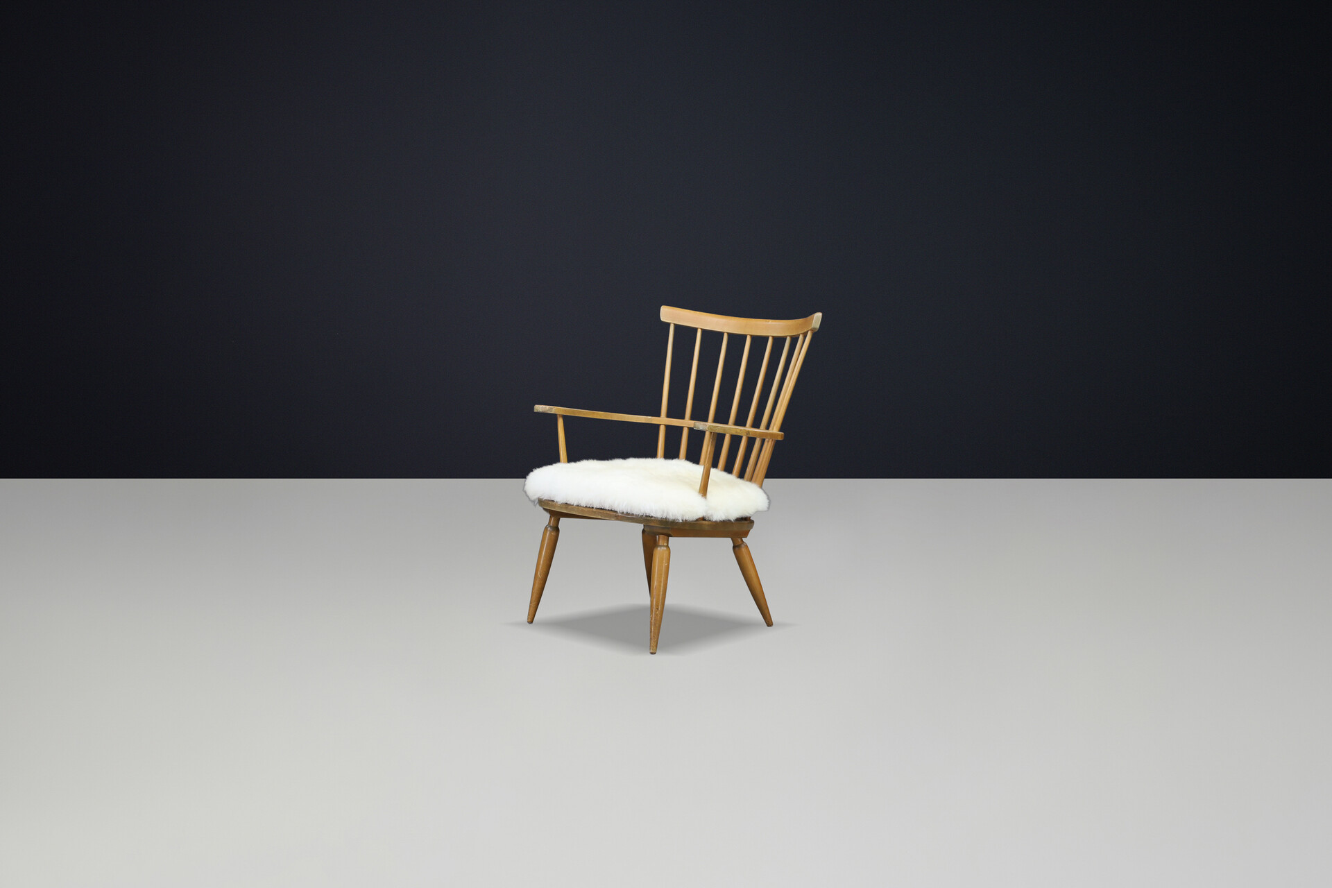 Mid century modern Beechwood Armchairs with sheepskin cushions for Altheim by Franz Schuster 1950s Austria. Mid-20th century