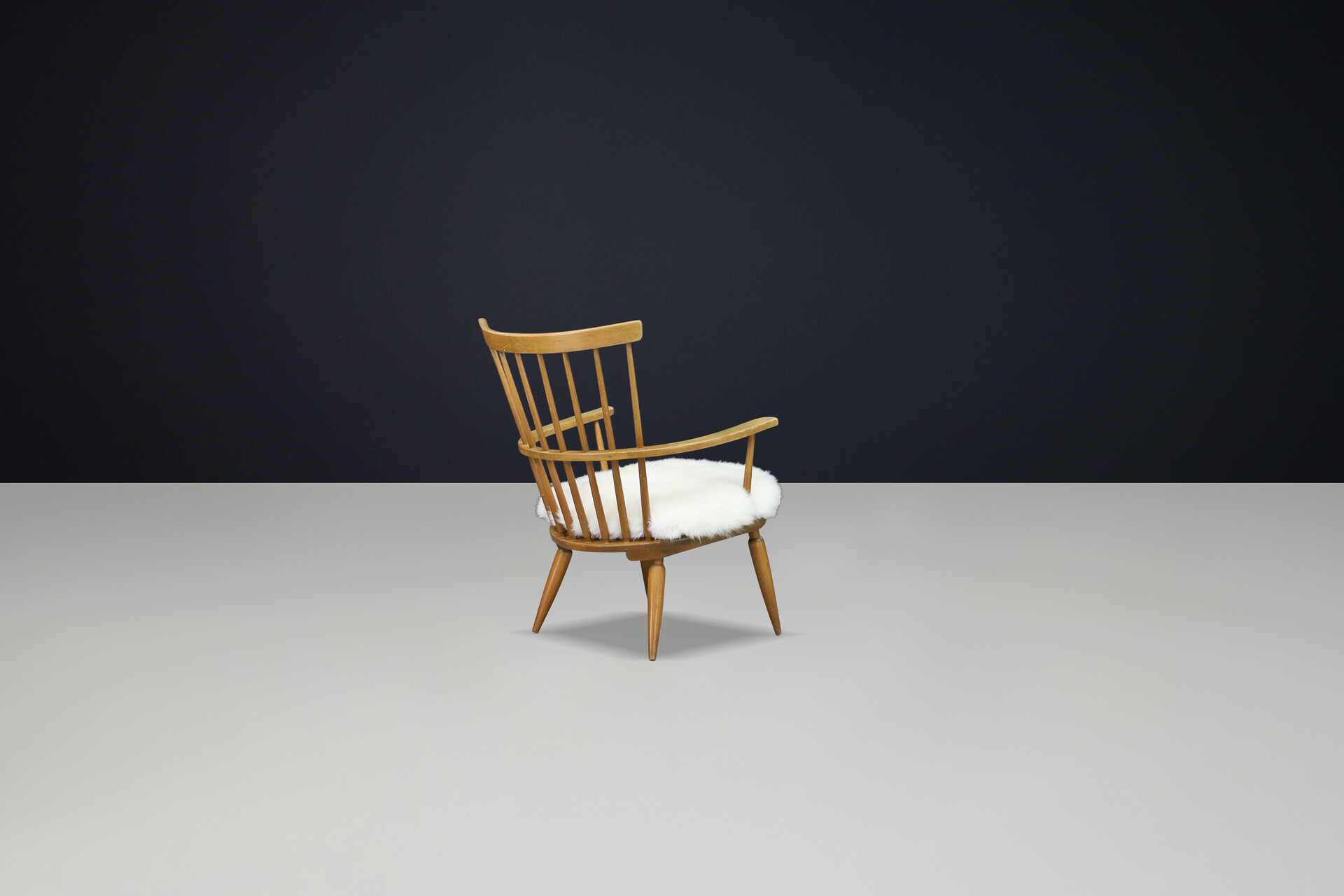 Mid century modern Beechwood Armchairs with sheepskin cushions for Altheim by Franz Schuster 1950s Austria. Mid-20th century