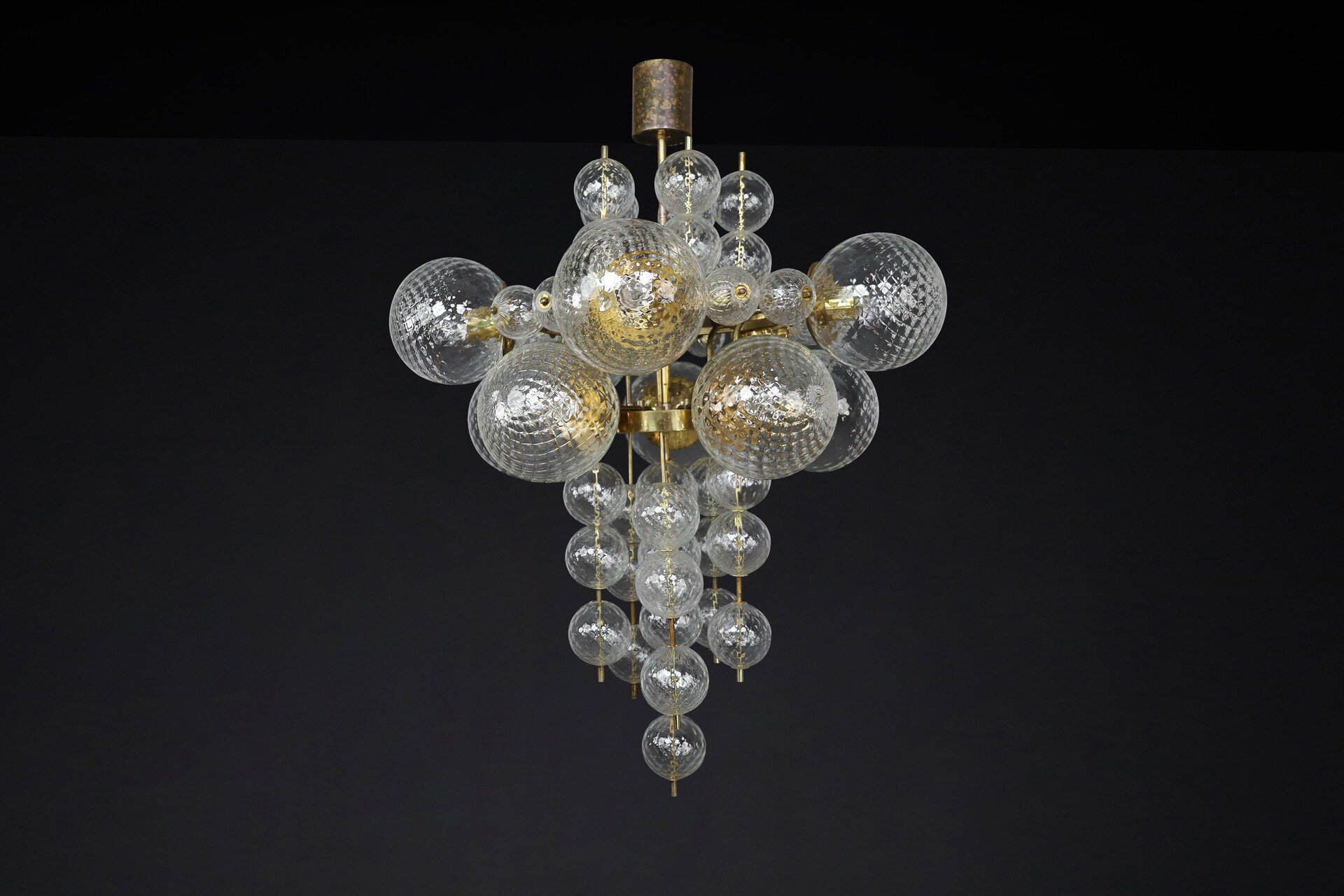 Mid century modern Chandelier with patinated brass fixture and hand-blowed glass globes by Preciosa Cz. Mid-20th century