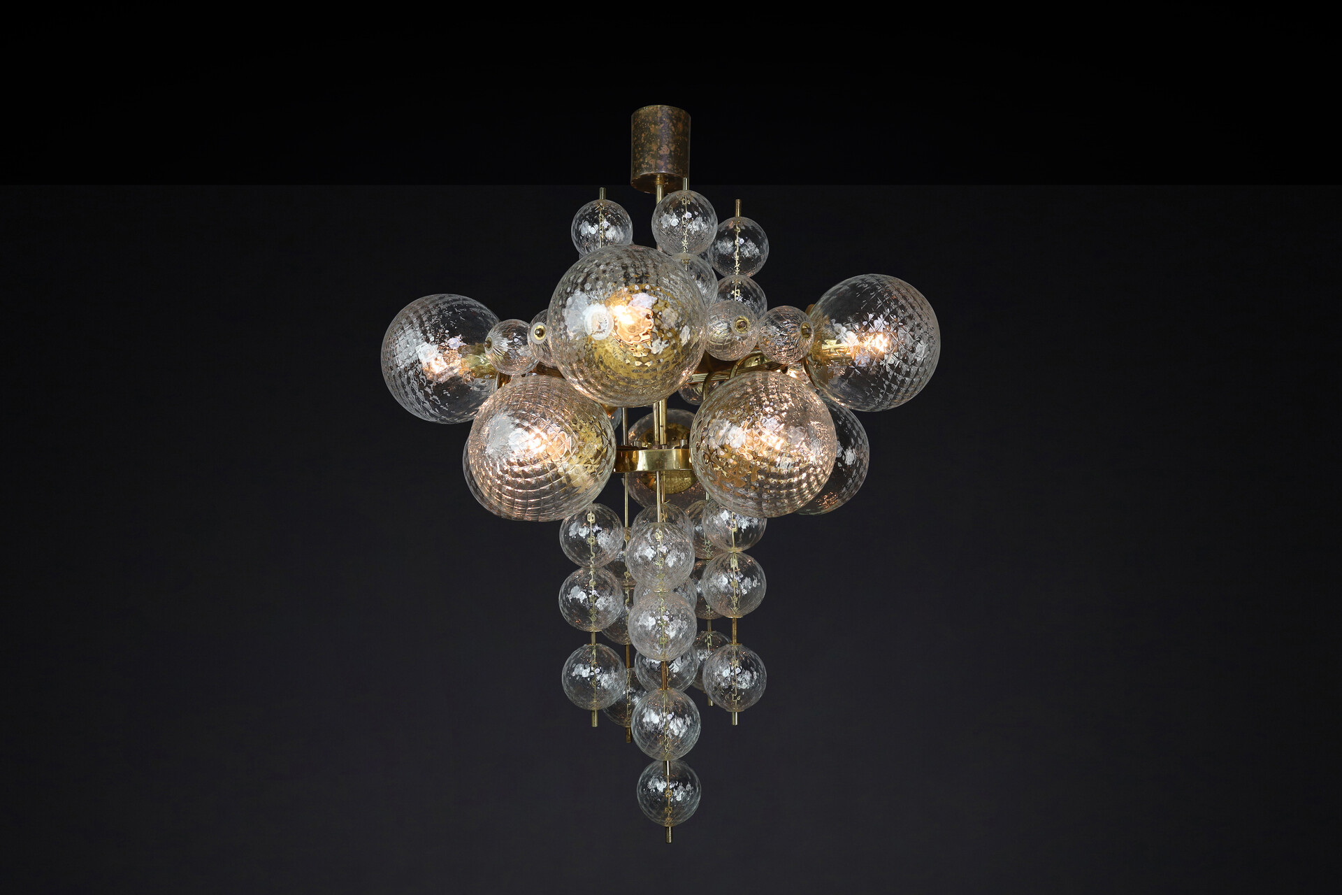 Mid century modern Chandelier with patinated brass fixture and hand-blowed glass globes by Preciosa Cz. Mid-20th century