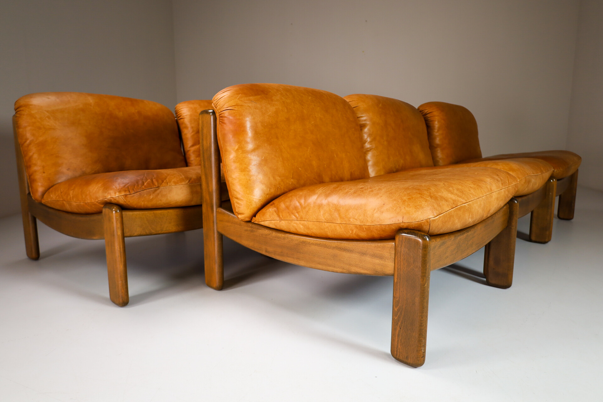 Mid century modern Cognac Leather Lounge Chairs / sectional sofa By Carl Straub Germany Mid-20th century