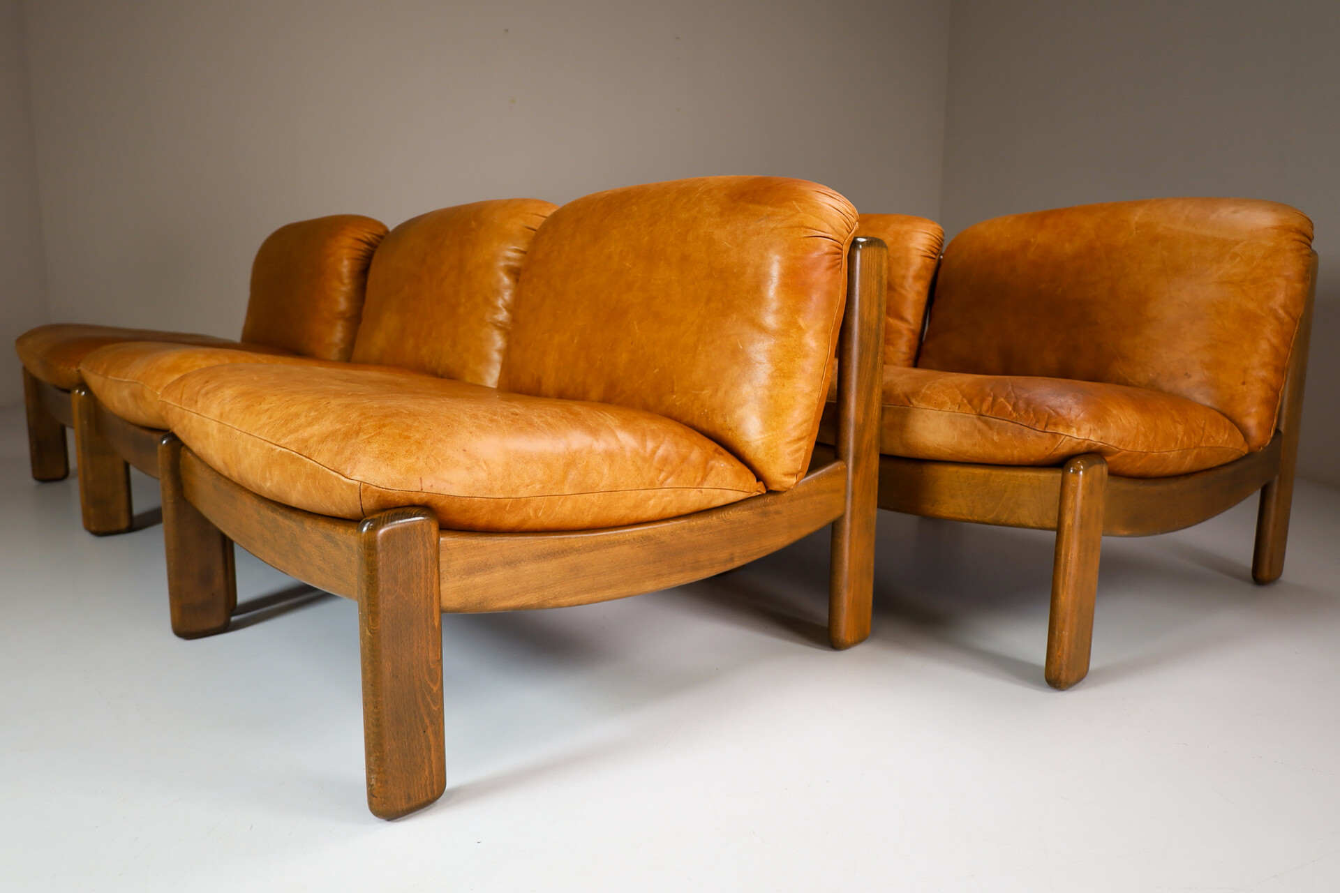 Mid century modern Cognac Leather Lounge Chairs / sectional sofa By Carl Straub Germany Mid-20th century
