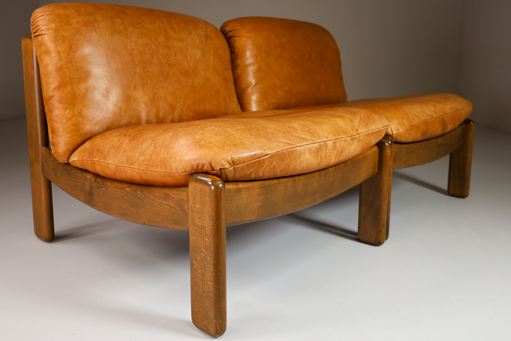 Mid century modern Cognac Leather Lounge Chairs / sectional sofa By Carl Straub Germany Mid-20th century