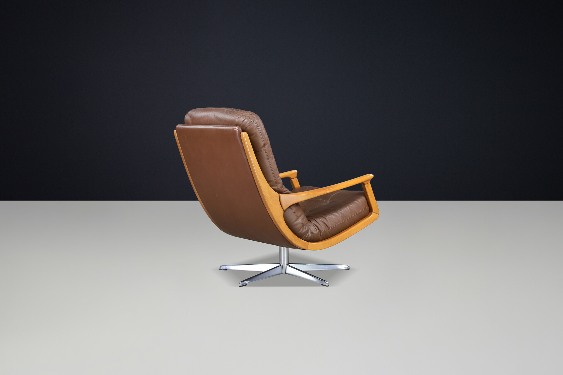 Mid century modern Eugen Schmidt swivel chair in Brown leather, Germany 1970s Late-20th century