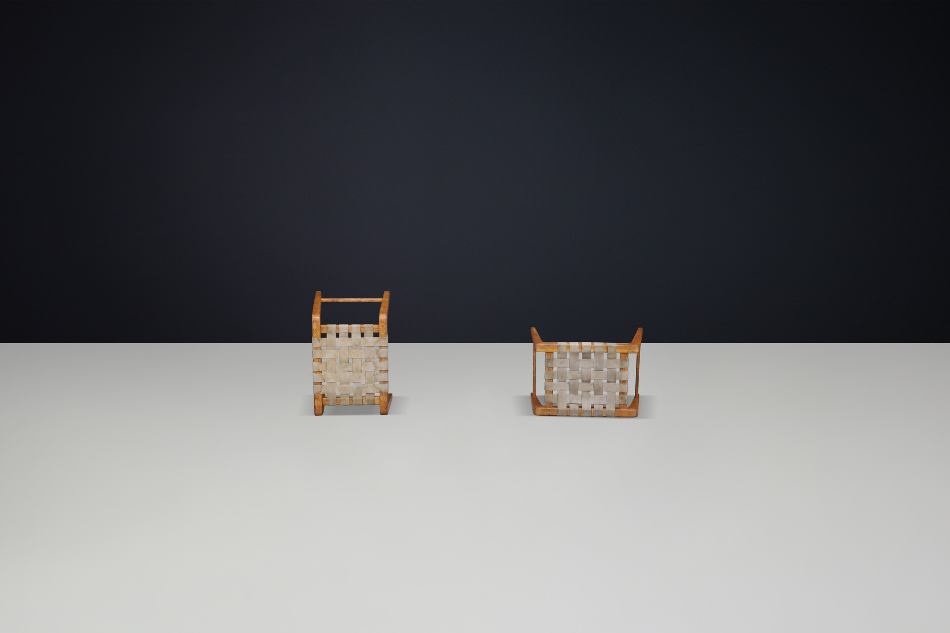 Mid century modern Jan Vanek sculptural set of two oak stools featuring woven canvas straps, 1940s Mid-20th century