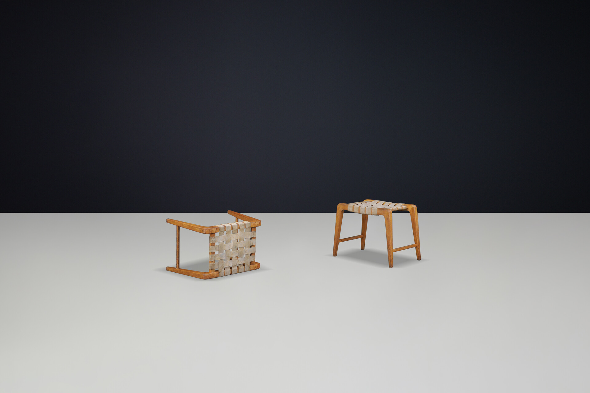 Mid century modern Jan Vanek sculptural set of two oak stools featuring woven canvas straps, 1940s Mid-20th century
