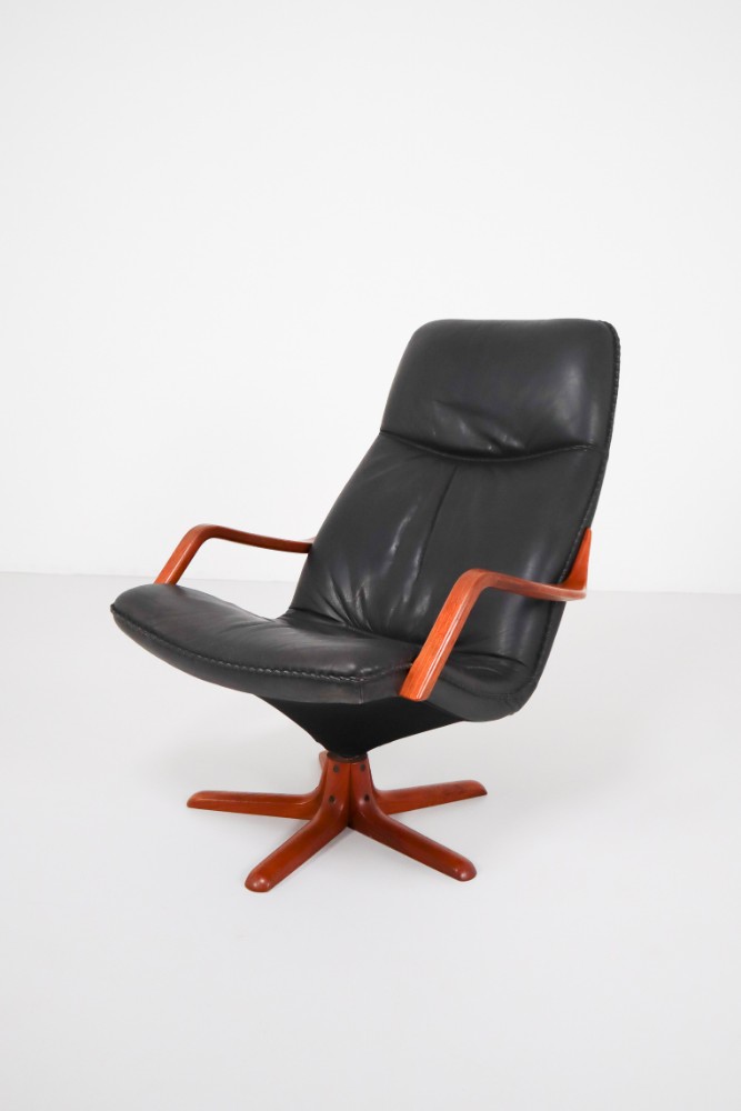 Mid century modern Leather 1970s Danish Leather and Teak Reclining Armchair and Ottomann 