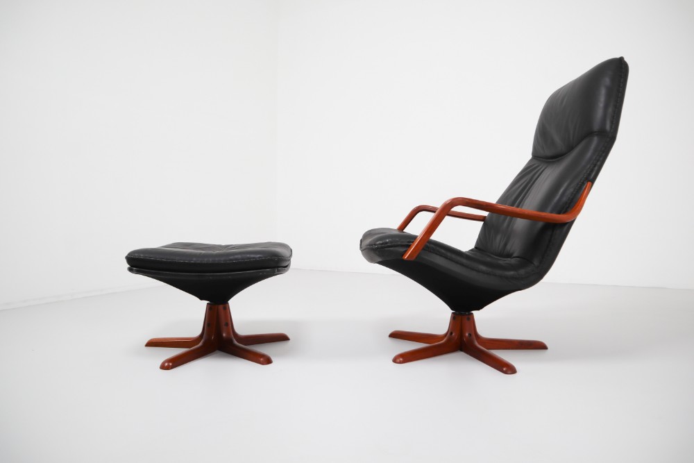 Mid century modern Leather 1970s Danish Leather and Teak Reclining Armchair and Ottomann 