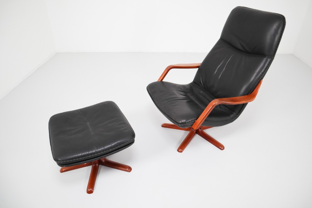 Mid century modern Leather 1970s Danish Leather and Teak Reclining Armchair and Ottomann 