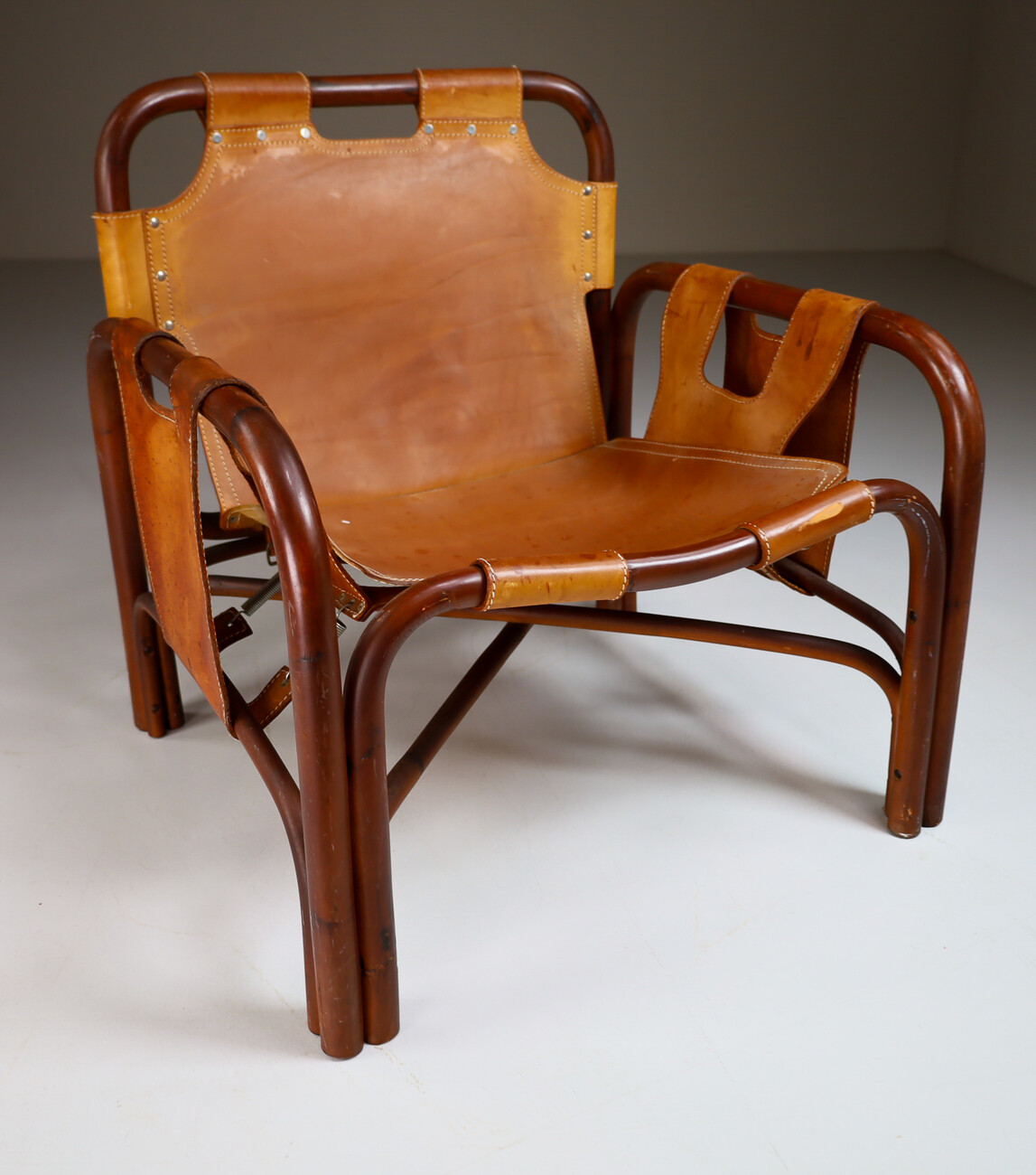 Mid century modern LEATHER AND BAMBOO LOUNGE CHAIRS BY TITO AGNOLI