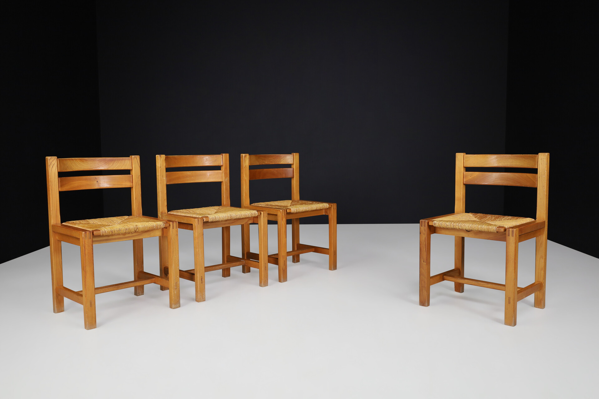 Mid century modern Maison Regain Dining chairs in elm and rush, France 1970s Late-20th century