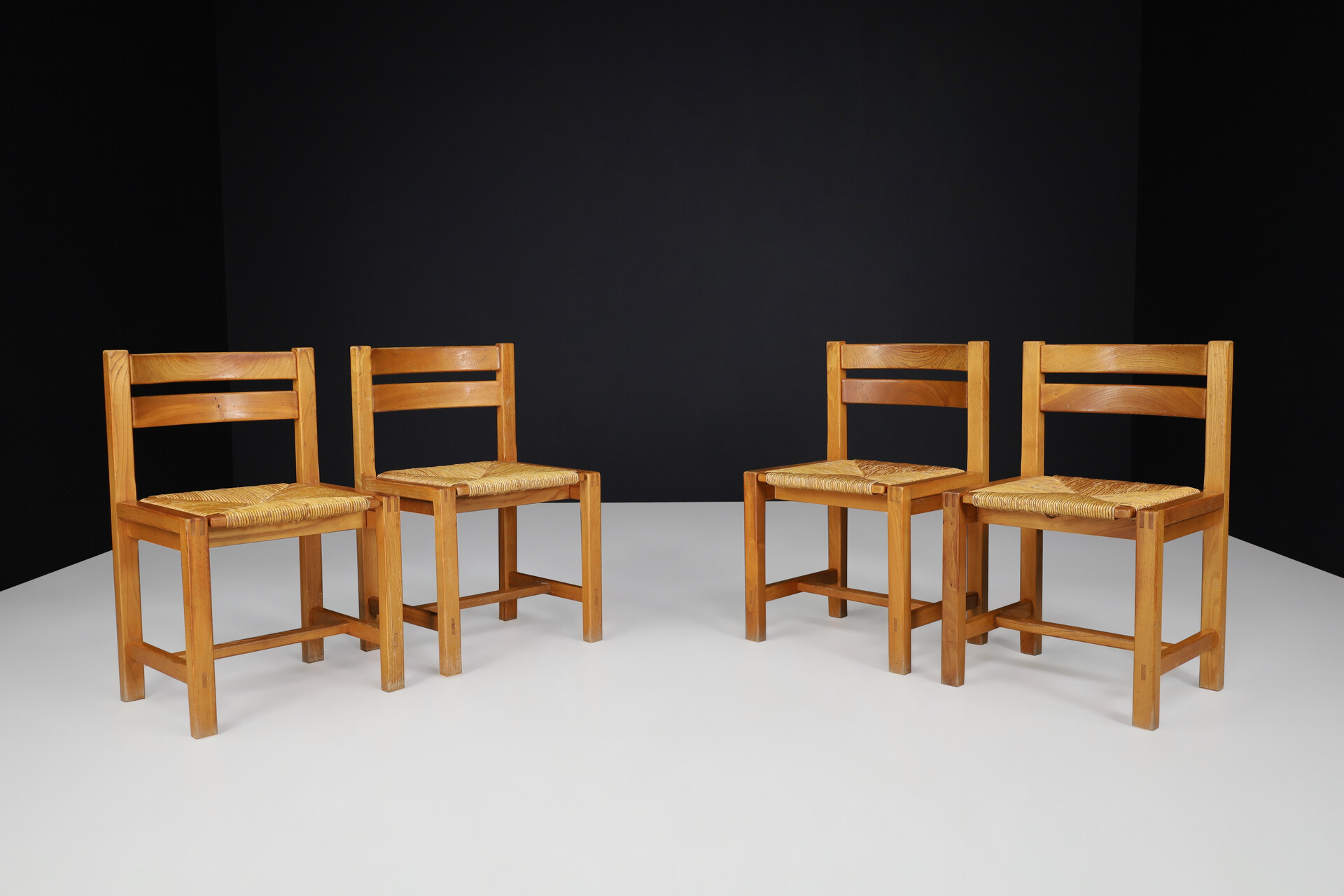 Mid century modern Maison Regain Dining chairs in elm and rush, France 1970s Late-20th century