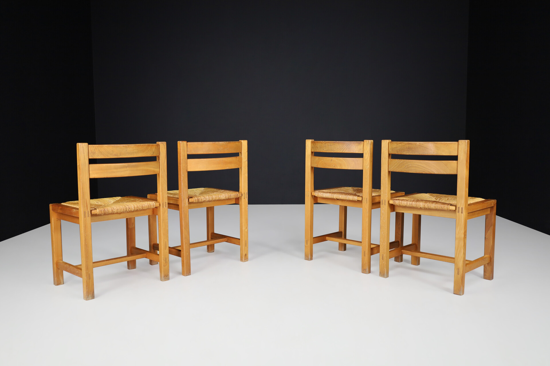 Mid century modern Maison Regain Dining chairs in elm and rush, France 1970s Late-20th century