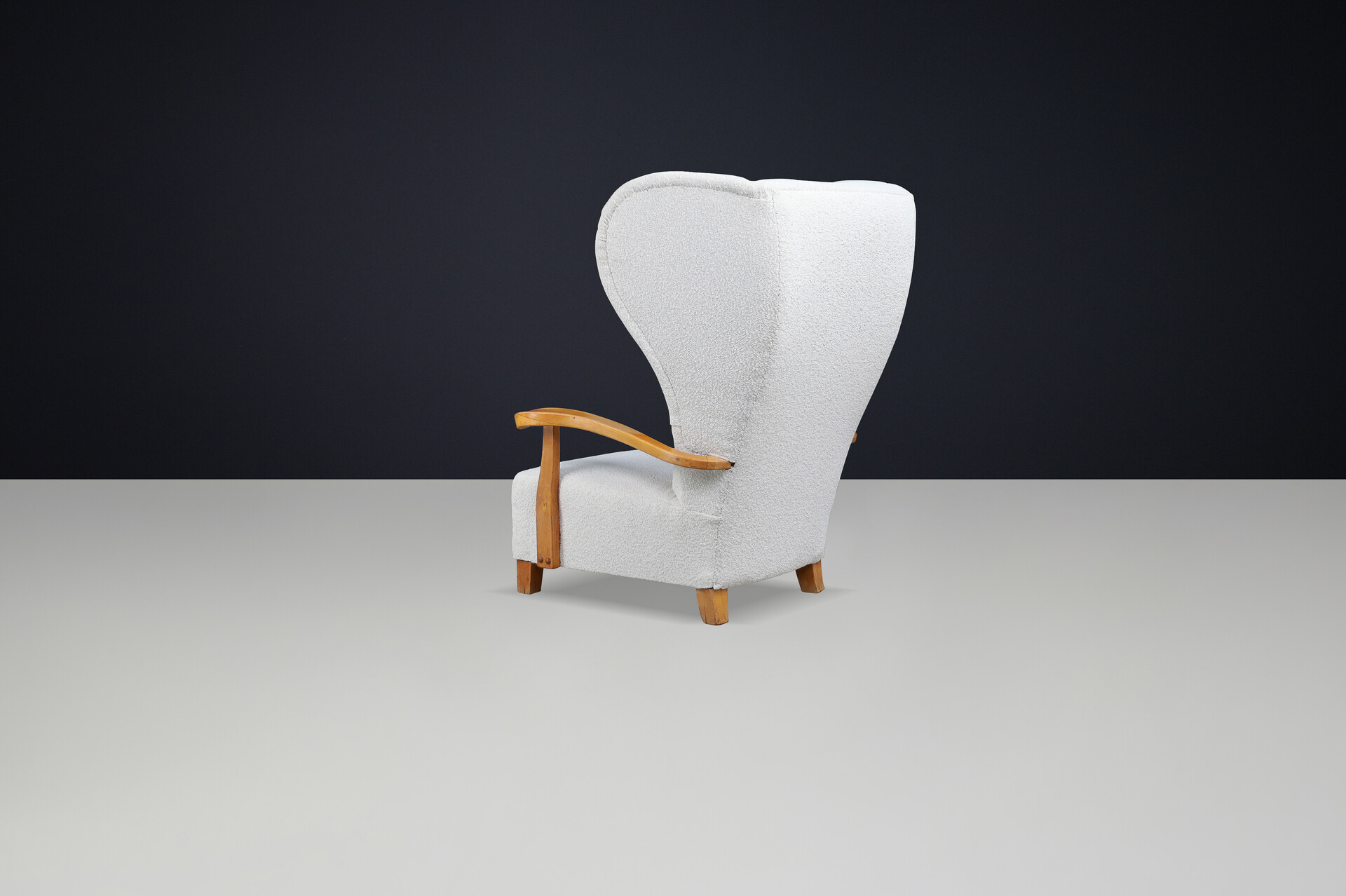 Mid century modern Monumental 1930s French Wingback Armchair in Ivory Bouclé with Sculpted Frame Mid-20th century