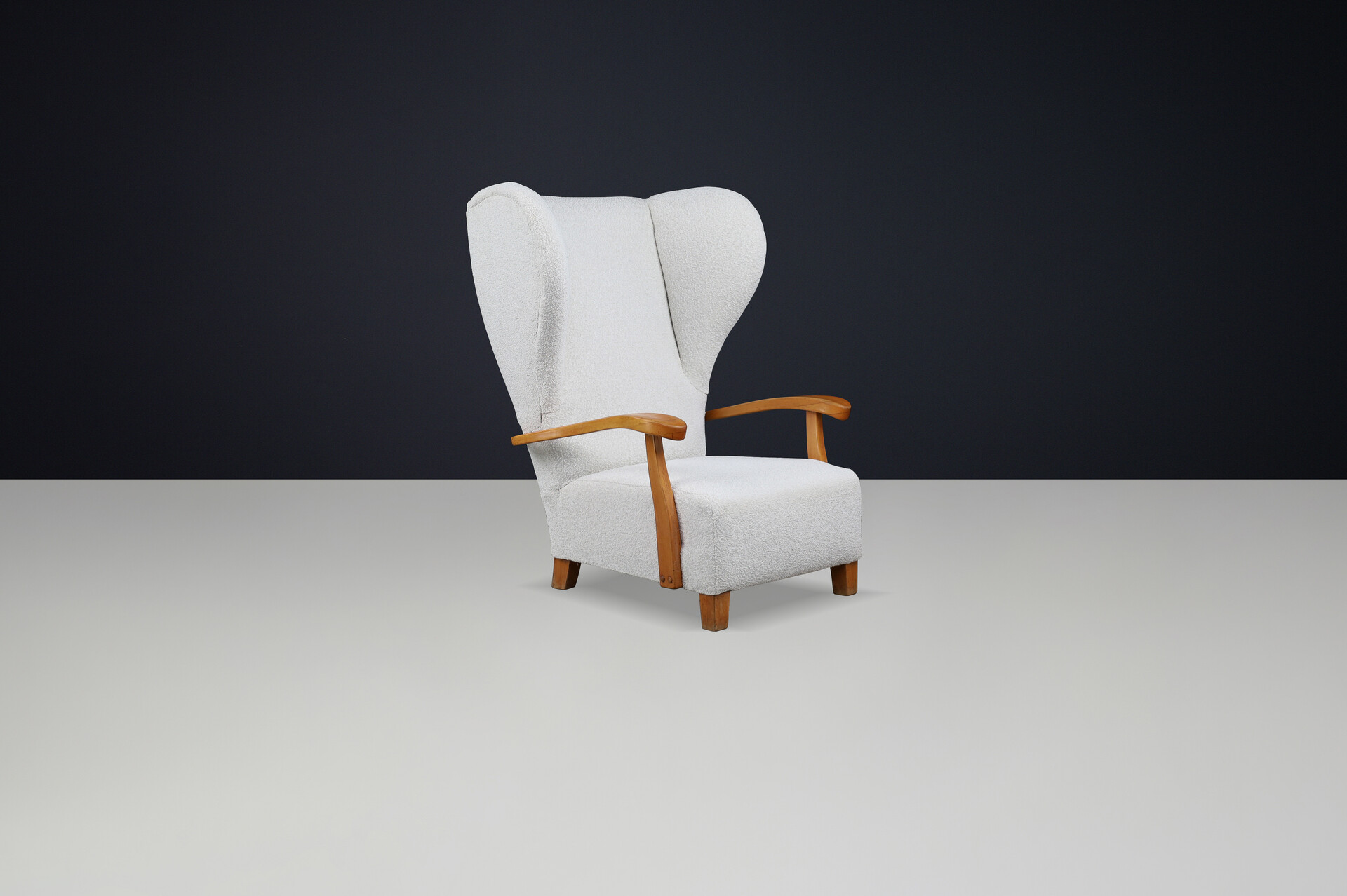 Mid century modern Monumental 1930s French Wingback Armchair in Ivory Bouclé with Sculpted Frame Mid-20th century