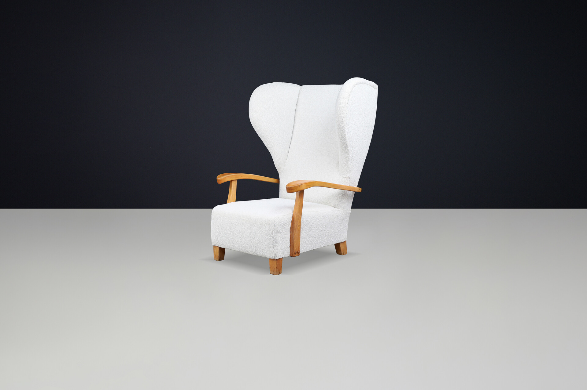 Mid century modern Monumental 1930s French Wingback Armchair in Ivory Bouclé with Sculpted Frame Mid-20th century