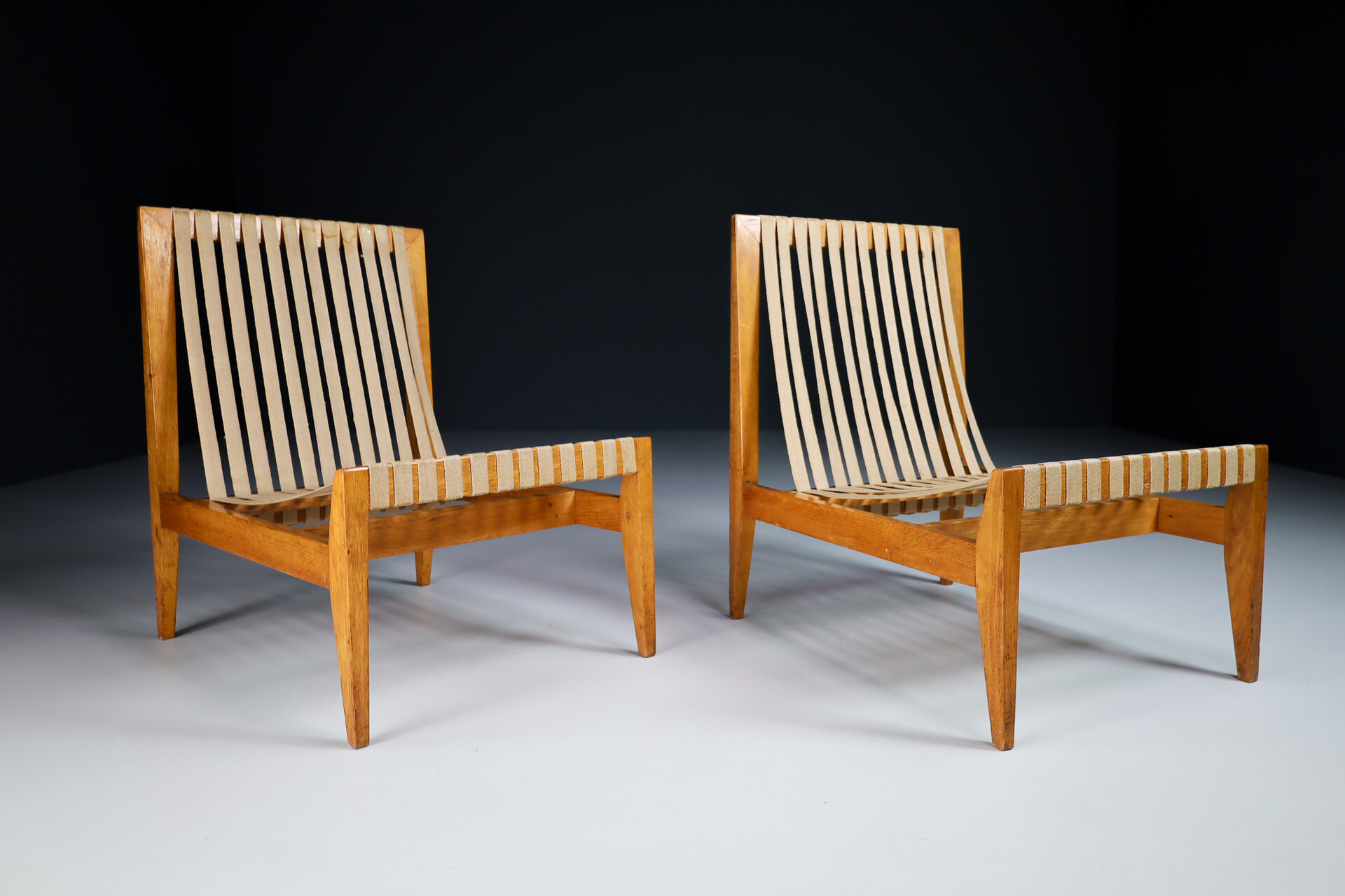 Mid century modern Pair Minimalist Oak and Canvas Lounge chairs, The Netherlands 1940s Mid-20th century