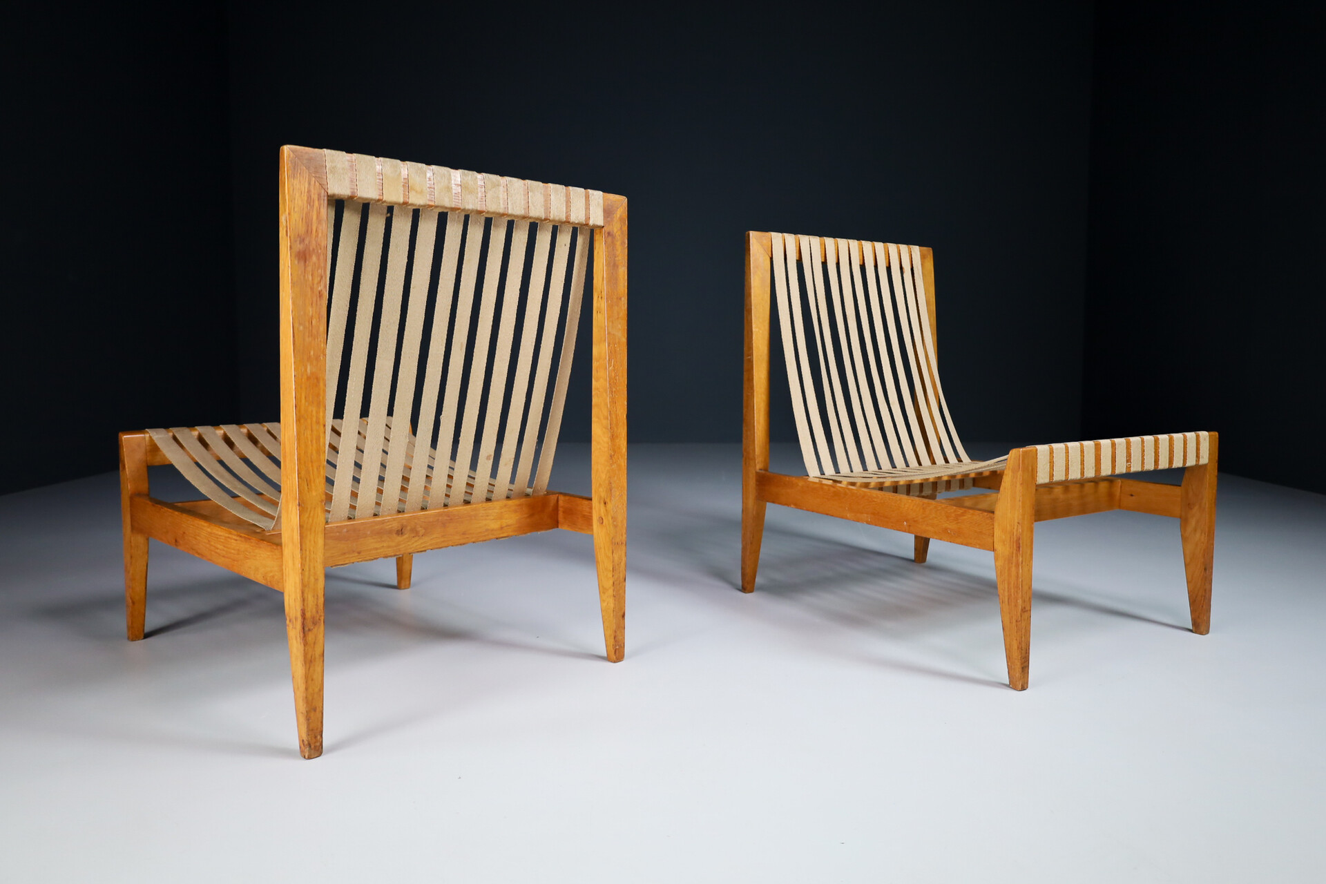 Mid century modern Pair Minimalist Oak and Canvas Lounge chairs, The Netherlands 1940s Mid-20th century
