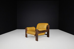 Mid century modern Patinated Leather and oak Lounge chair, The Netherlands 1970s Late-20th century