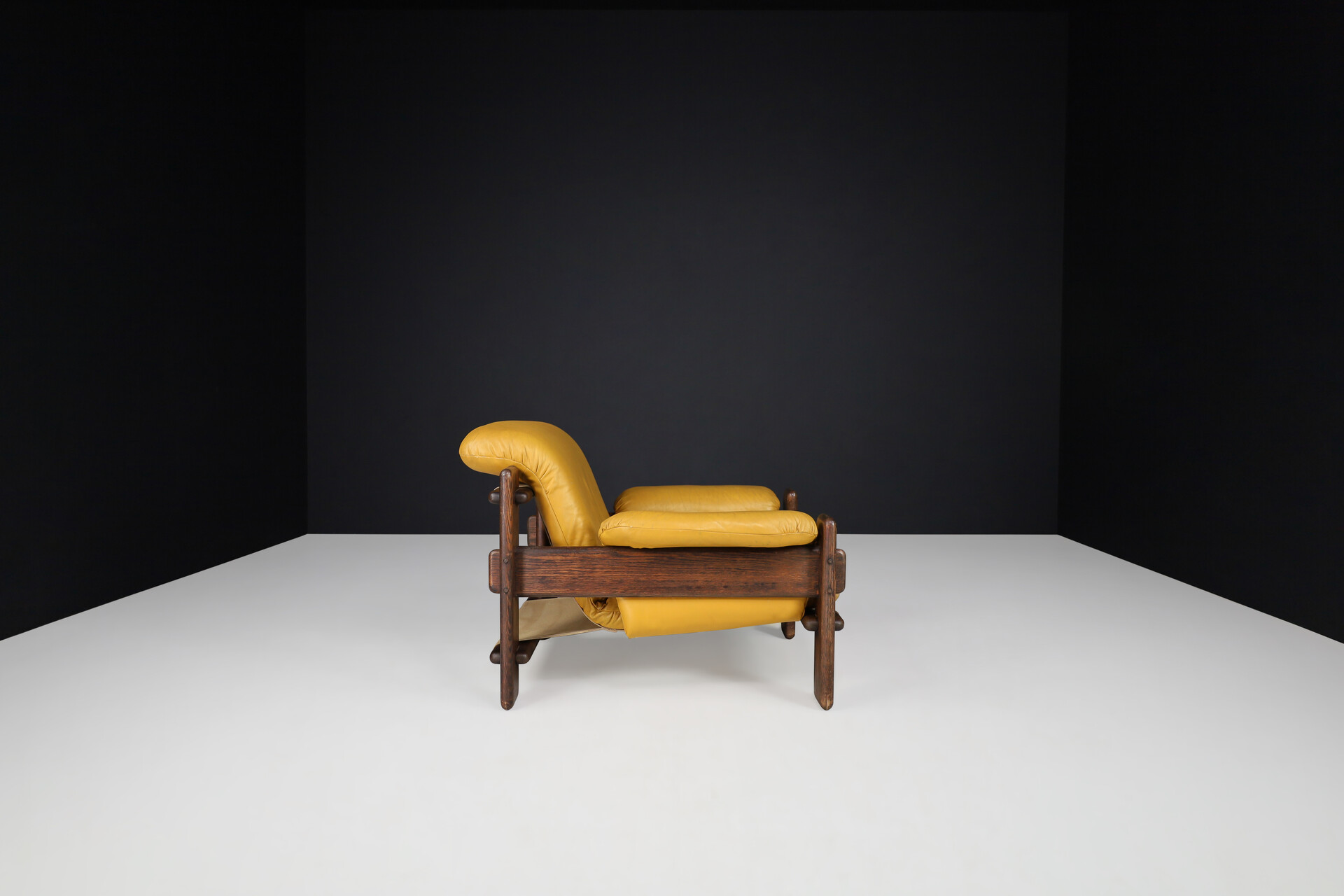 Mid century modern Patinated Leather and oak Lounge chair, The Netherlands 1970s Late-20th century