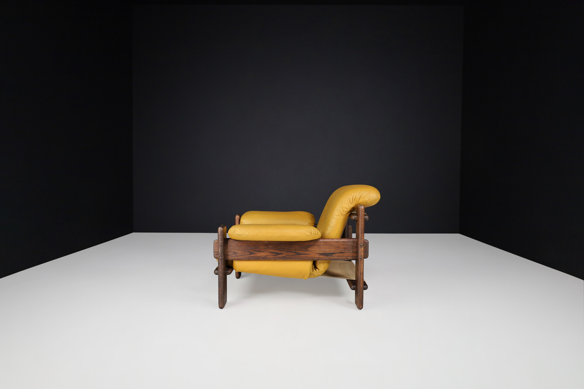 Mid century modern Patinated Leather and oak Lounge chair, The Netherlands 1970s Late-20th century