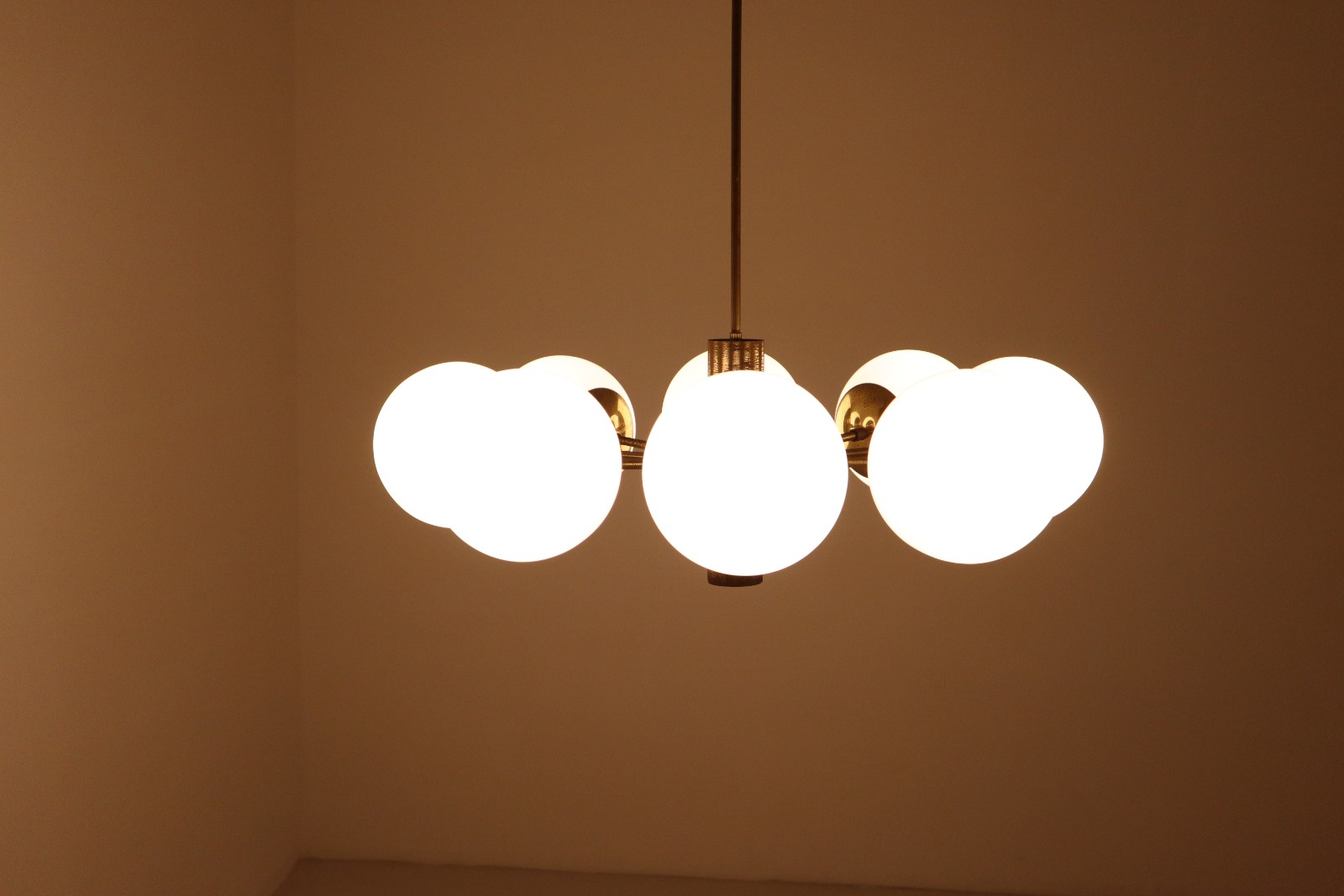 Mid century modern Strong Patinated brass chandelier with opaline globes , Germany 1960s Mid-20th century