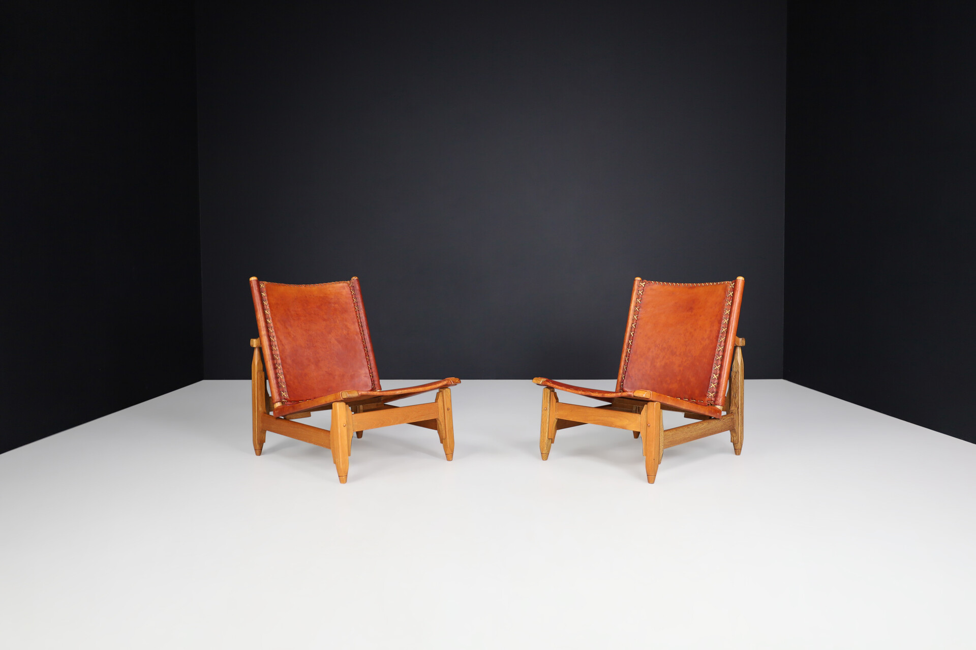 Mid century modern WERNER BIERMANN FOR ARTE SANO cognac leather and oak lounge chairs 1960s Mid-20th century