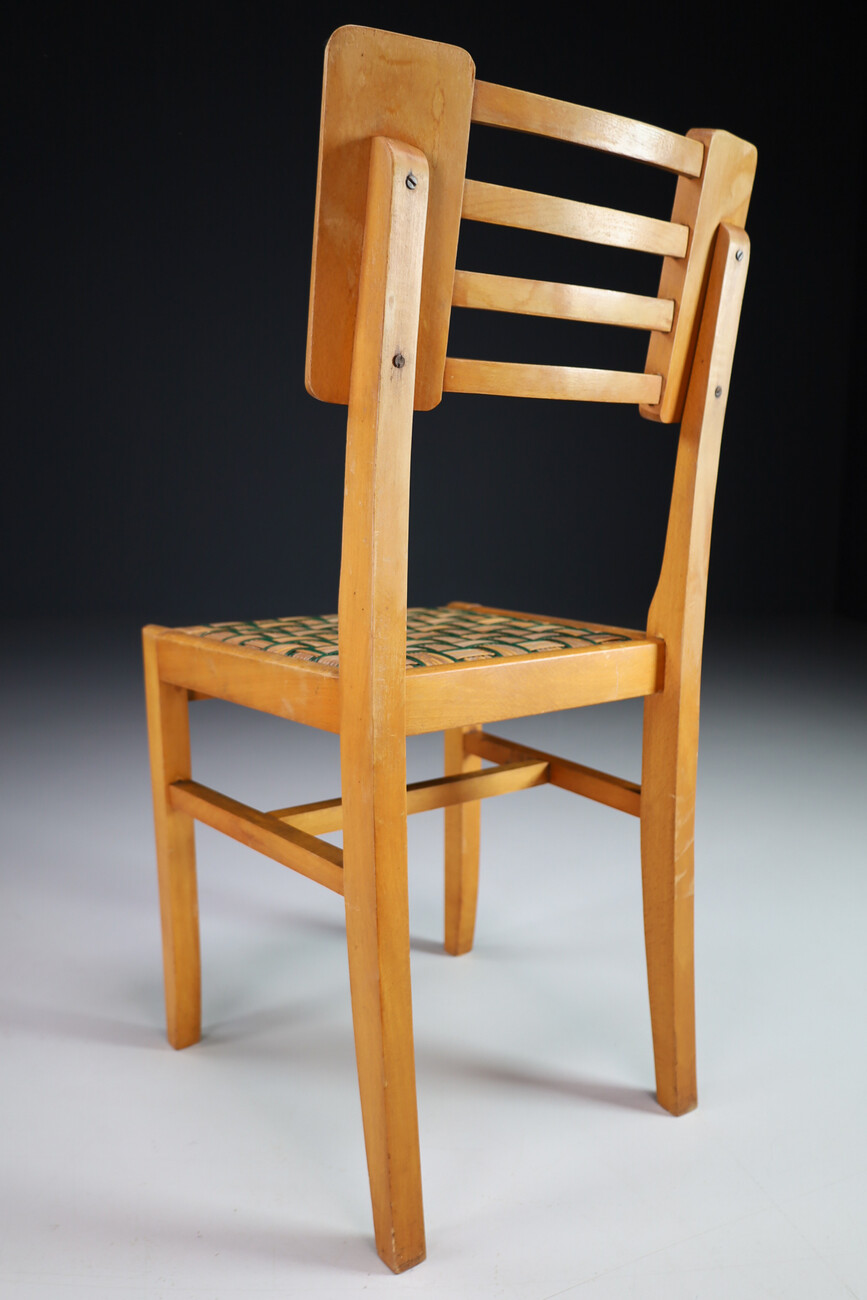 Mid century modern Wood Dining Chairs by Pierre Cruege in Oak and Cane, France, 1940s Mid-20th century
