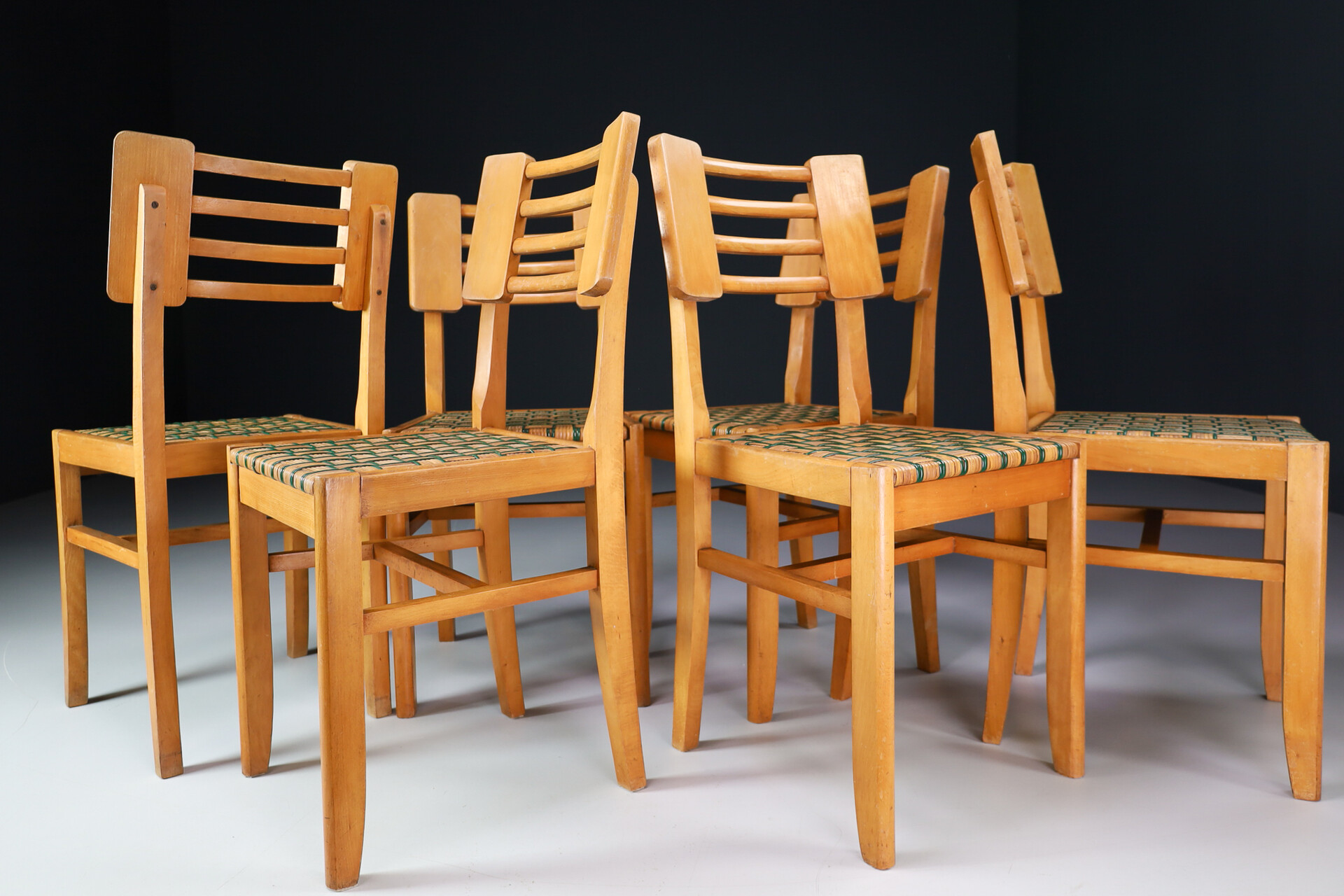Mid century modern Wood Dining Chairs by Pierre Cruege in Oak and Cane, France, 1940s Mid-20th century