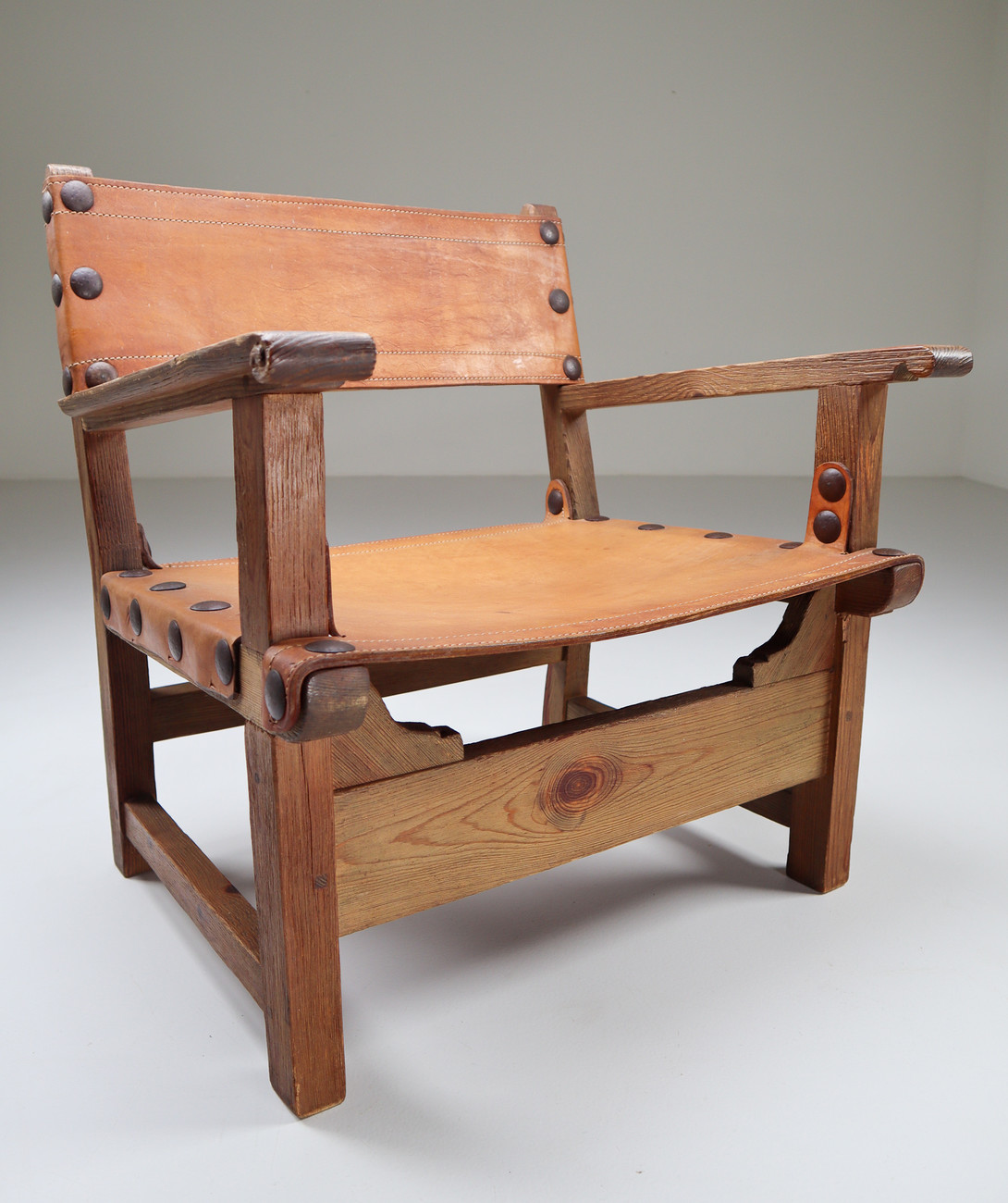 Midcentury French Lounge Chair in Patinated Cognac Saddle Leather, 1950s Mid-20th century