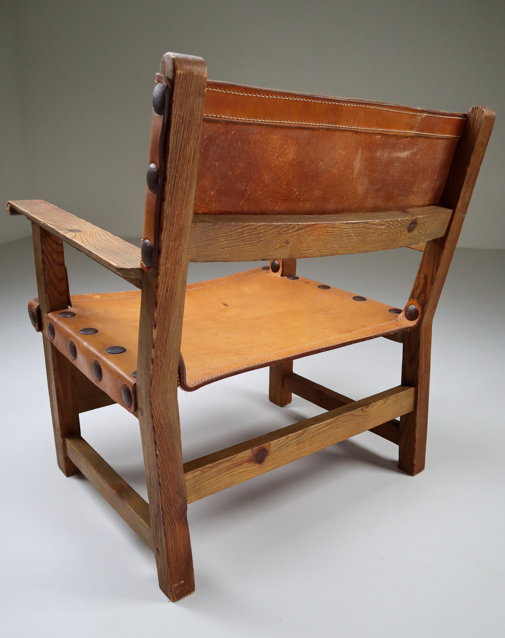 Midcentury French Lounge Chair in Patinated Cognac Saddle Leather, 1950s Mid-20th century