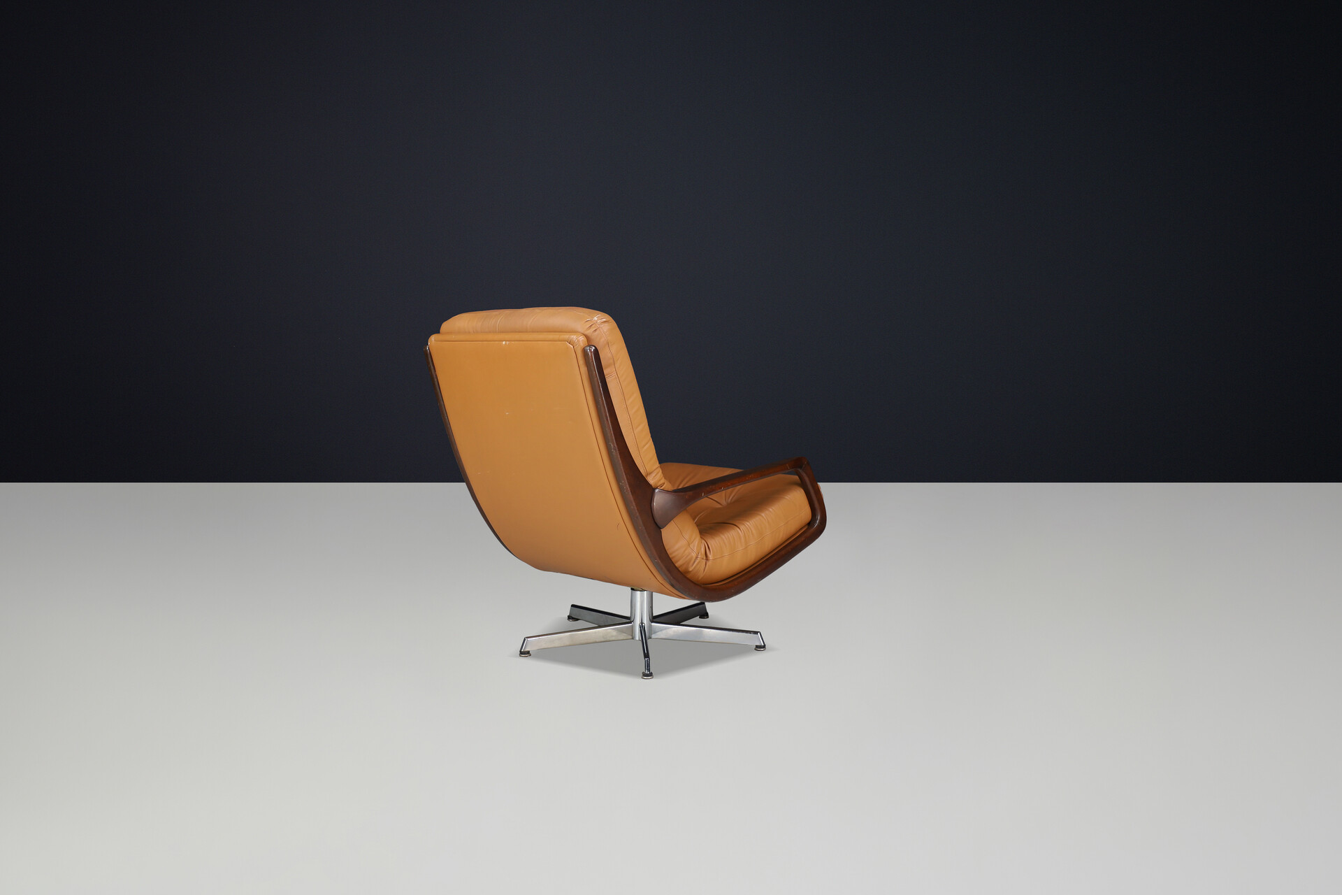 Modern Eugen Schmidt swivel chair and ottomann, Germany 1970s Late-20th century