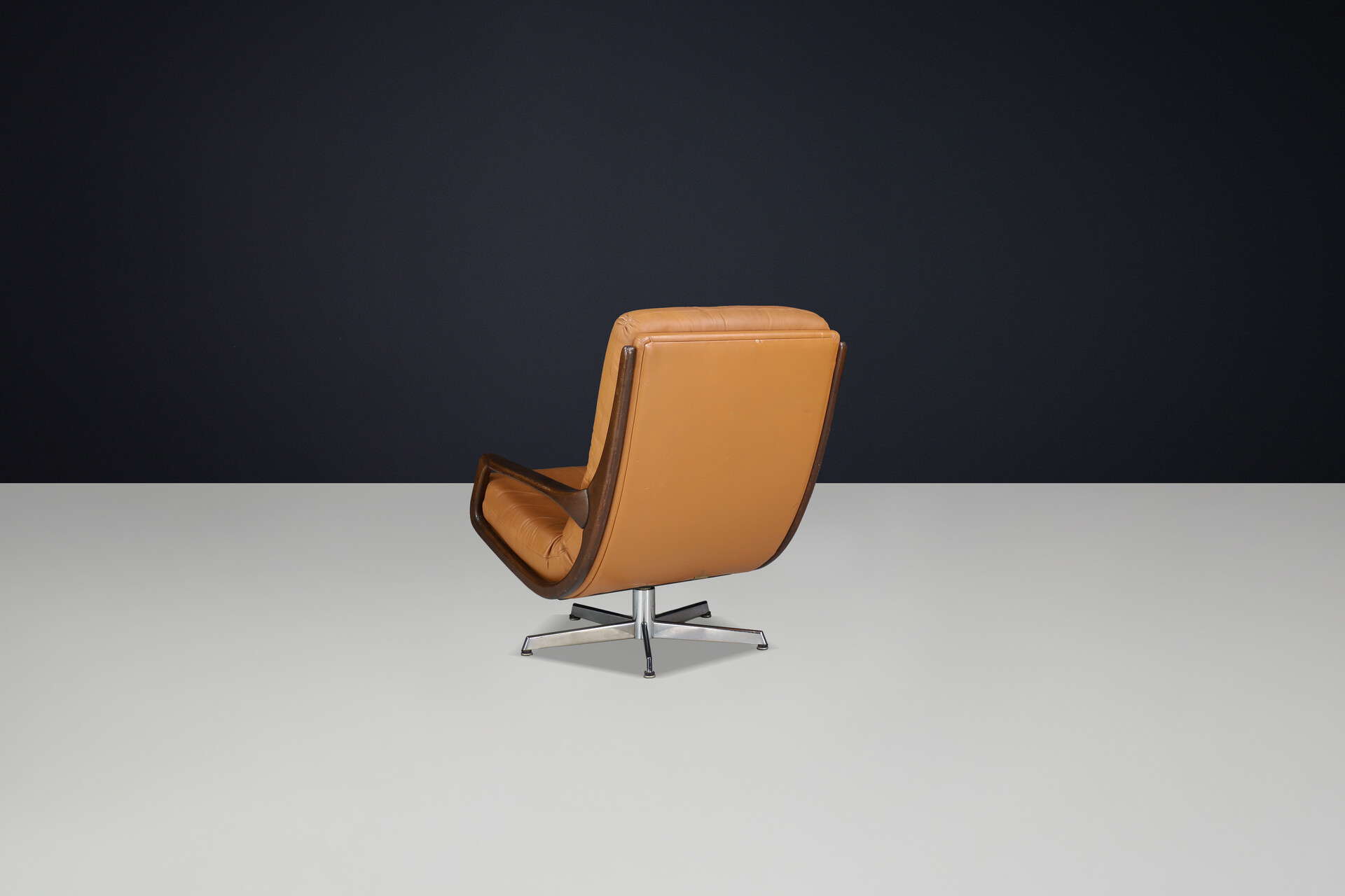 Modern Eugen Schmidt swivel chair and ottomann, Germany 1970s Late-20th century