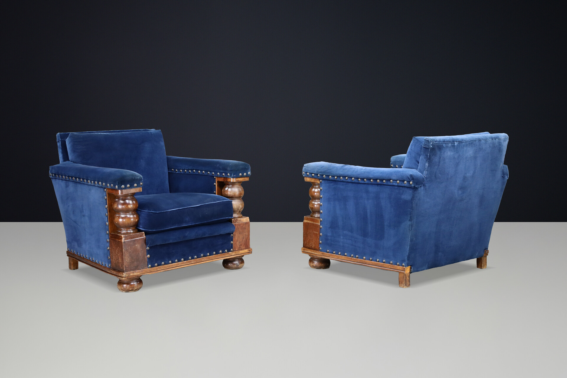 Monumental 1930s French armchairs Château-scale proportions Patinated Walnut Early-20th century