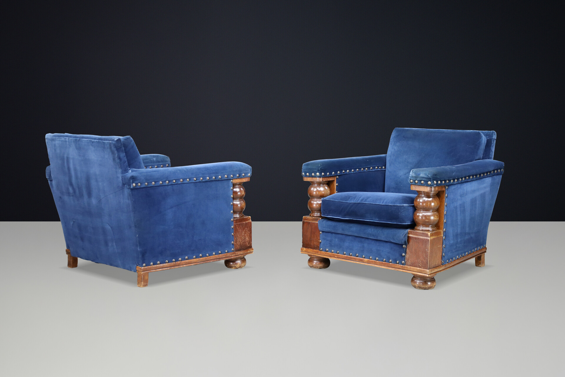 Monumental 1930s French armchairs Château-scale proportions Patinated Walnut Early-20th century