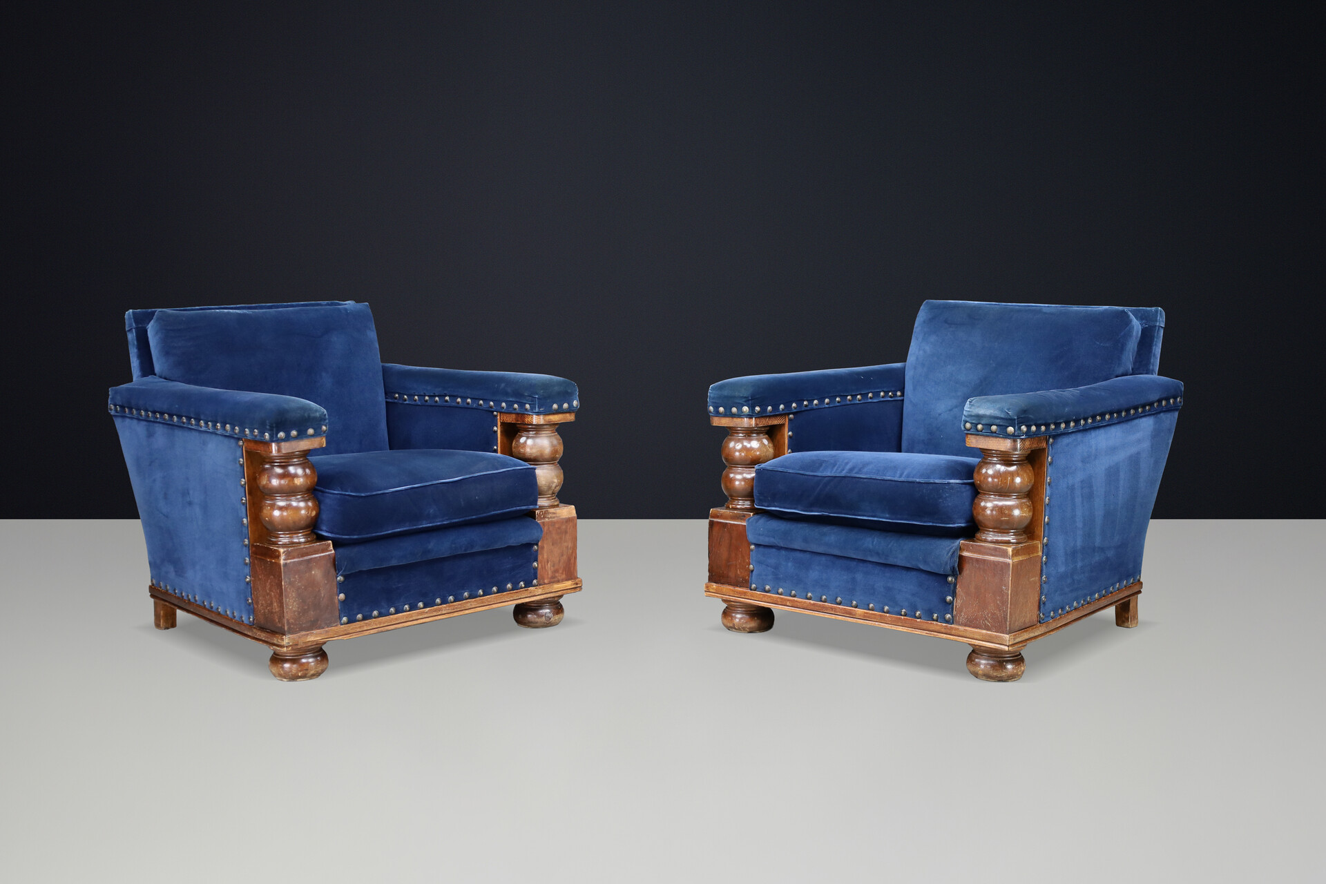 Monumental 1930s French armchairs Château-scale proportions Patinated Walnut Early-20th century