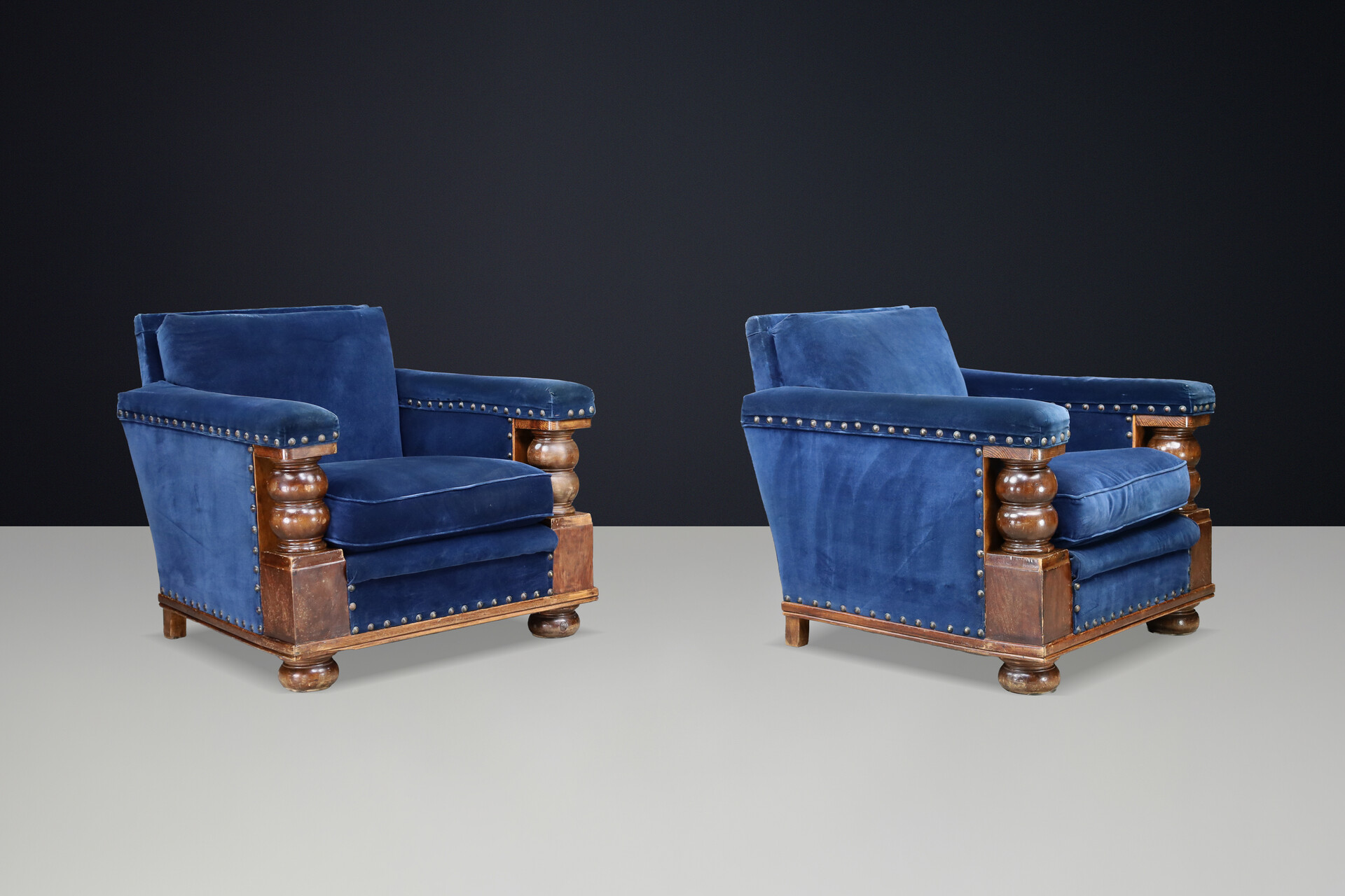 Monumental 1930s French armchairs Château-scale proportions Patinated Walnut Early-20th century