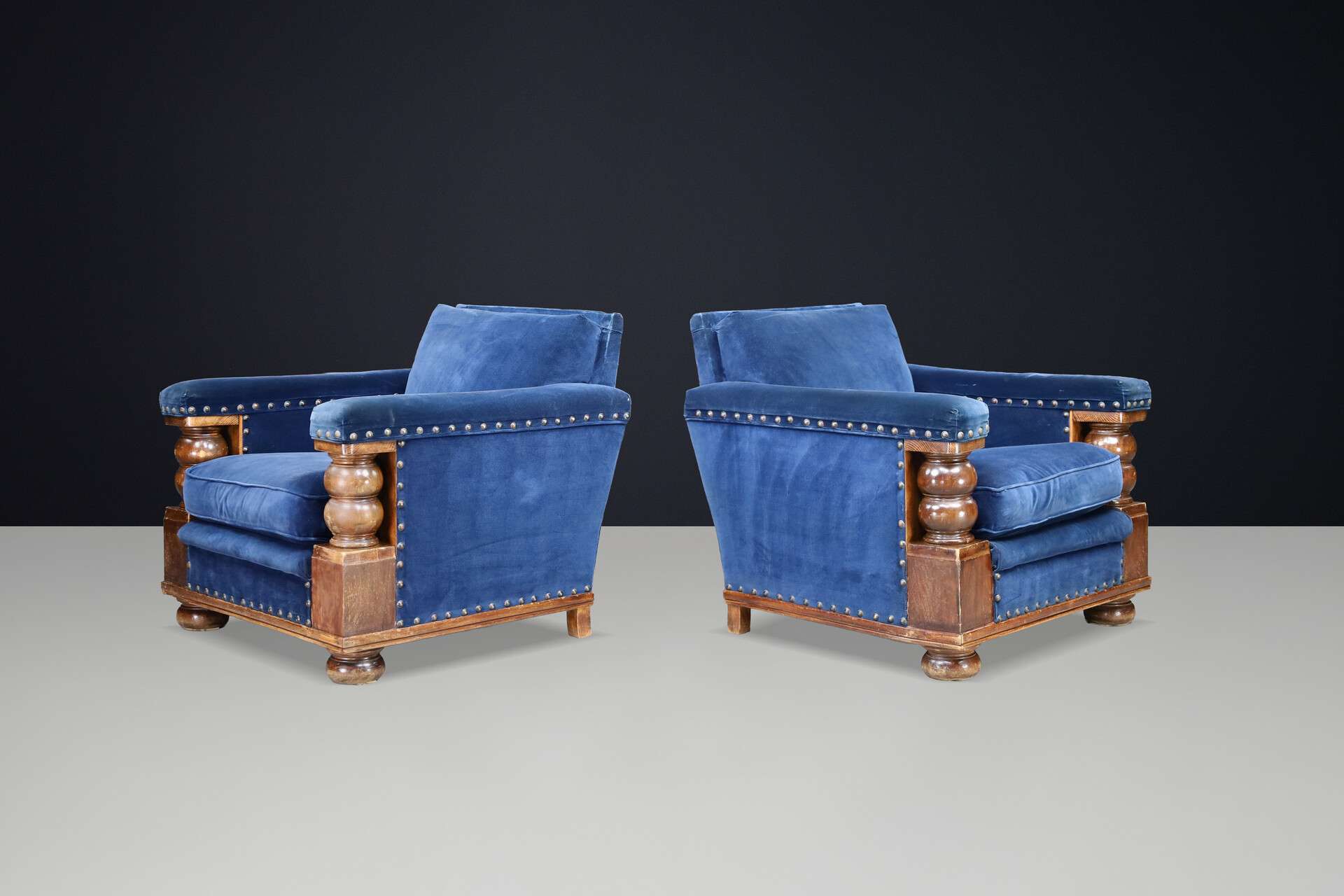 Monumental 1930s French armchairs Château-scale proportions Patinated Walnut Early-20th century