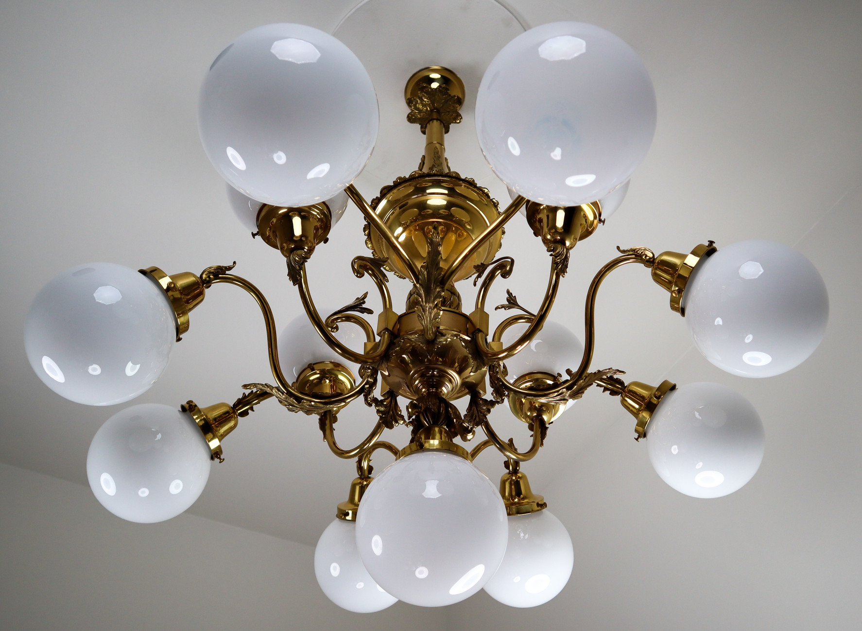 Monumental Brass Chandeliers with Opaline Glass Globes, National Gallery Praque. Early-20th century