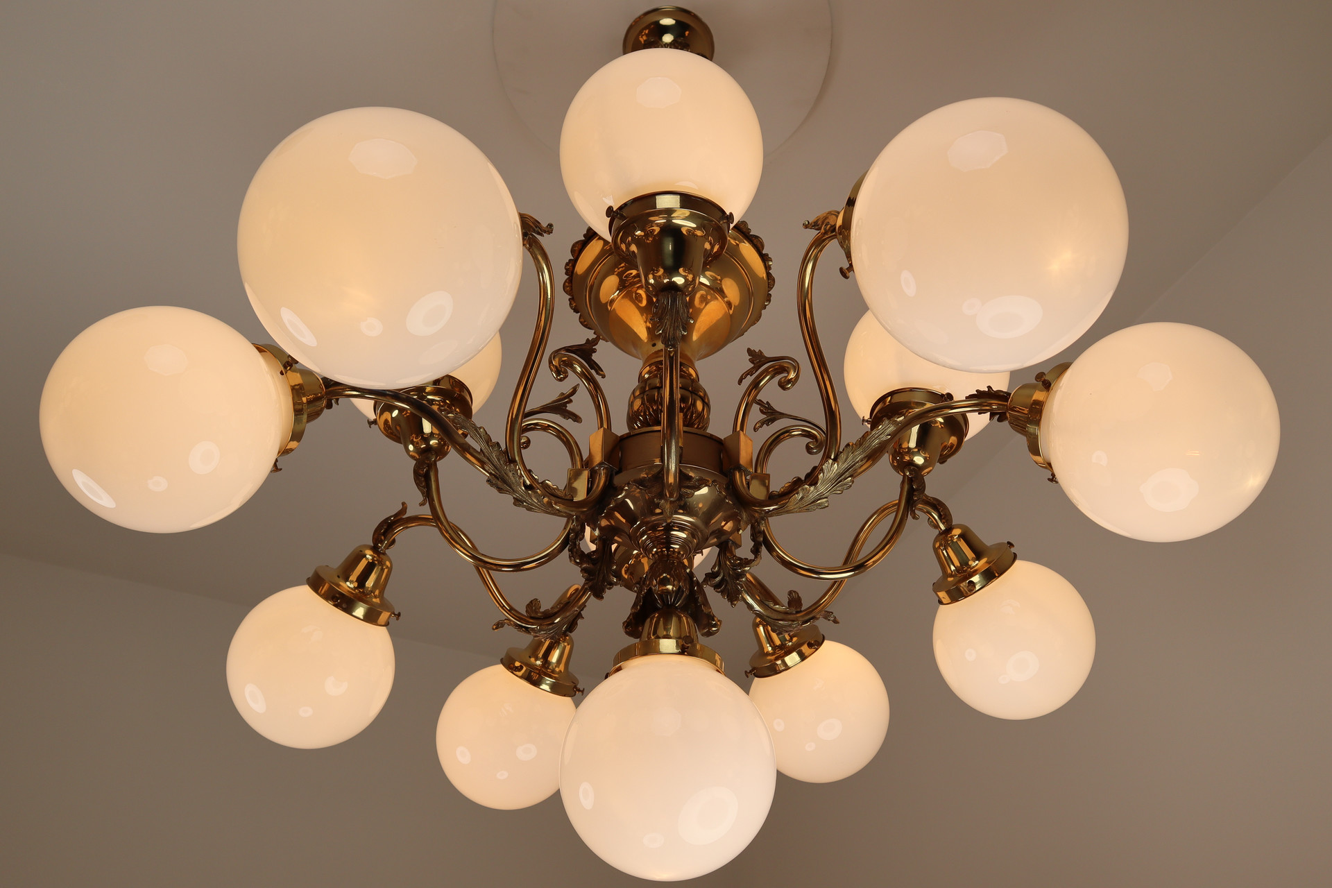 Monumental Brass Chandeliers with Opaline Glass Globes, National Gallery Praque. Early-20th century