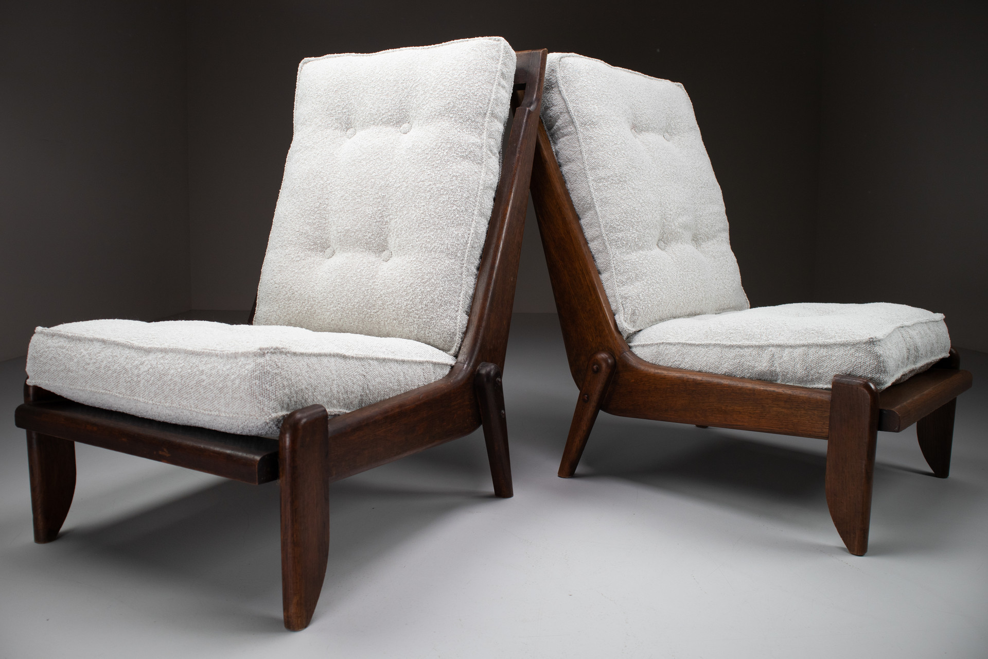 Pair Lounge chairs by Guillerme & Chambron with newly upholstered cushions in boucle fabric , France, circa 1950 Mid-20th century