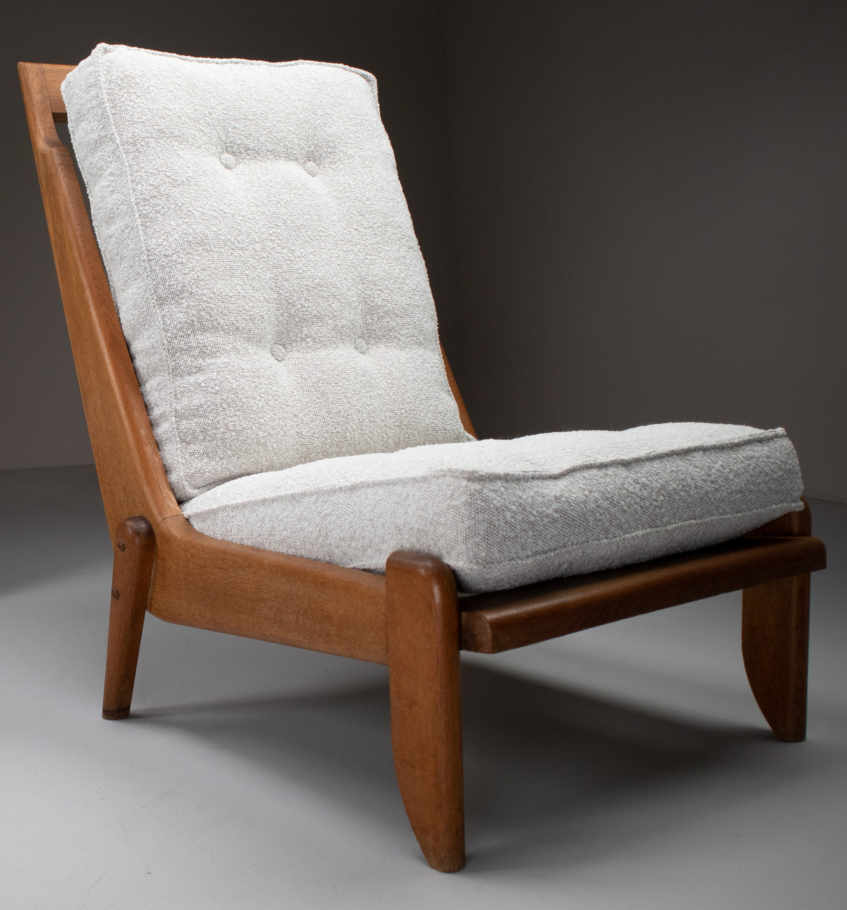 Pair Oak Lounge chairs by Guillerme & Chambron with newly upholstered cushions in boucle fabric , France, circa 1950 Mid-20th century